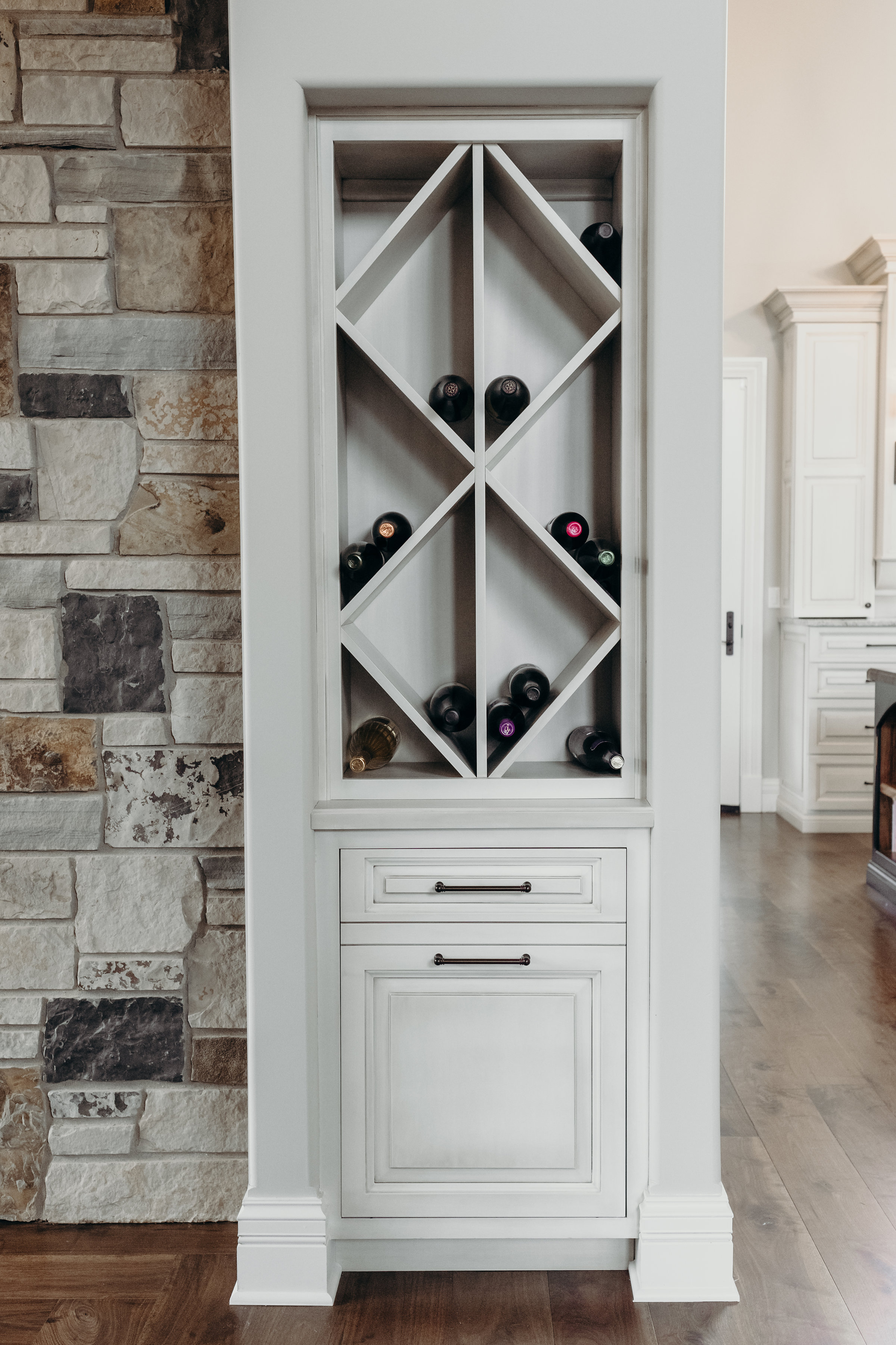 Custom wine cabinet with open shelves and soft close drawers