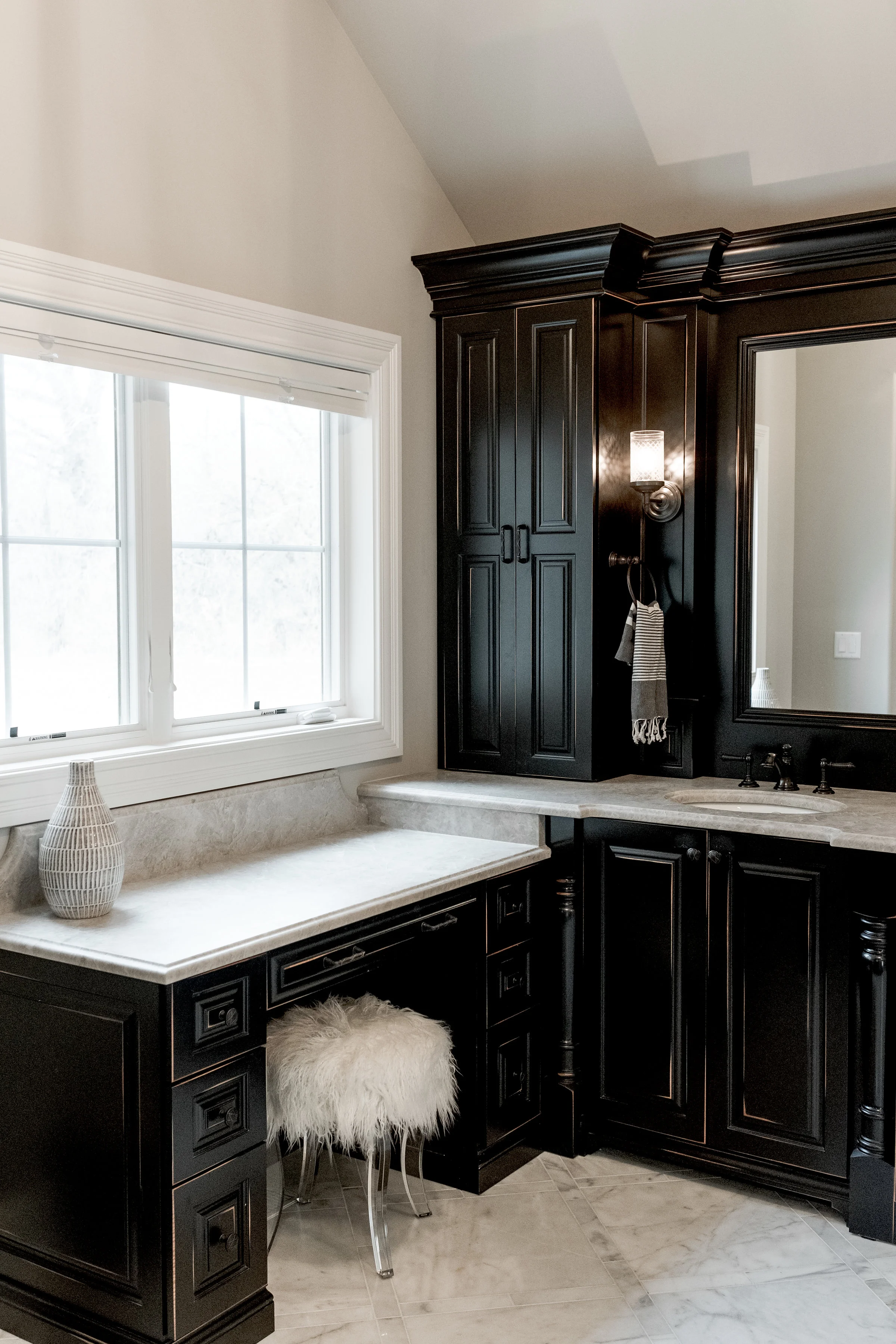 Dark wood custom cabinets in bathroom