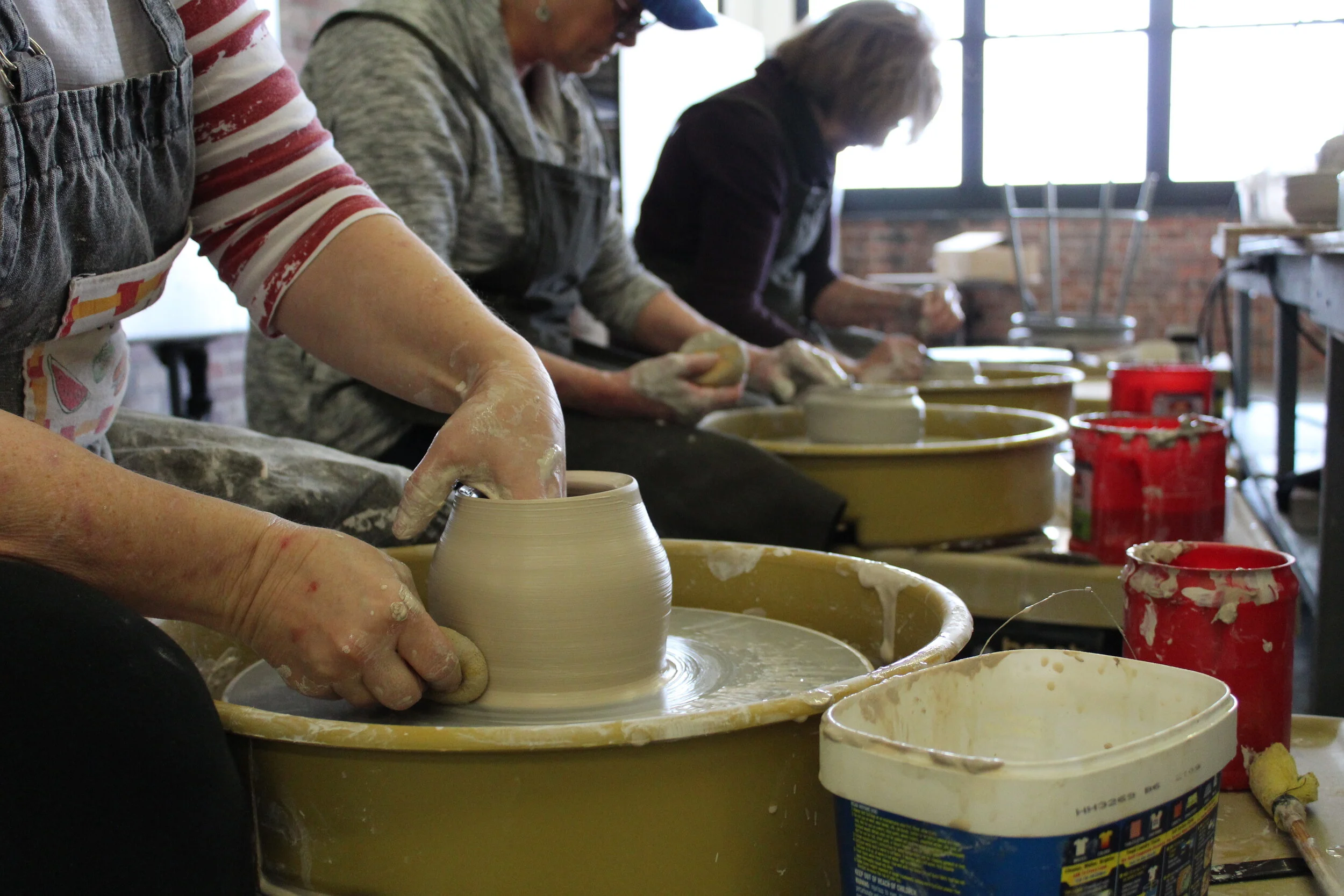 Studio Classes Wheel Throwing Group Androgynous Older Intermediate Adult Tracy.JPG