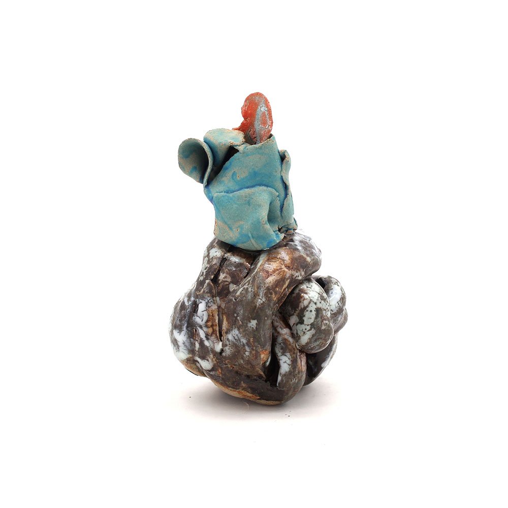Paperweight (brown fist with turquoise crown)