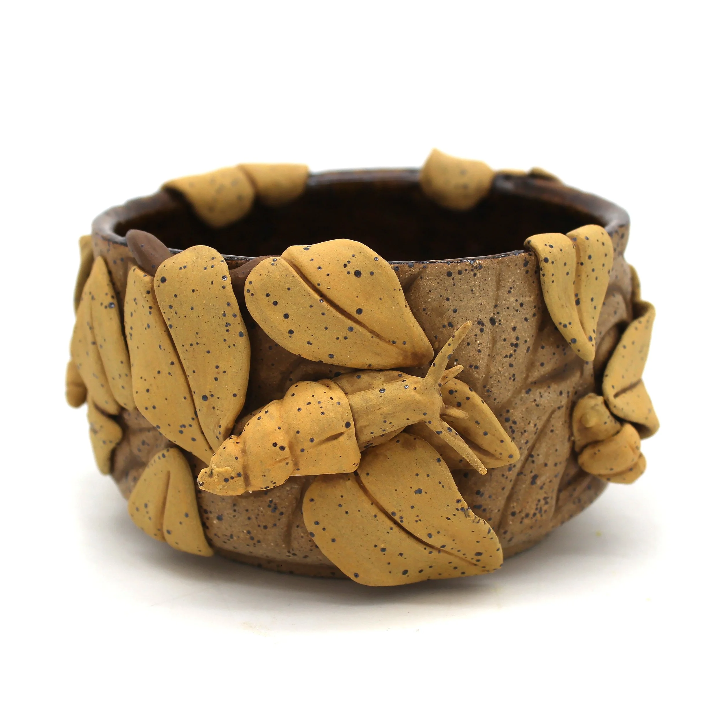 Erin Drake, "Forest Floor and Snail," 2026. Stoneware, underglaze, cone 6; 2.75 x 5.5 x 5 in. Image courtesy of the artist. 
