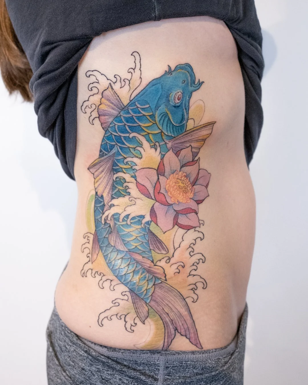 Very very tough spot! Thanks Melissa! Really got to use some colours on this koi fish.

#koitattoo