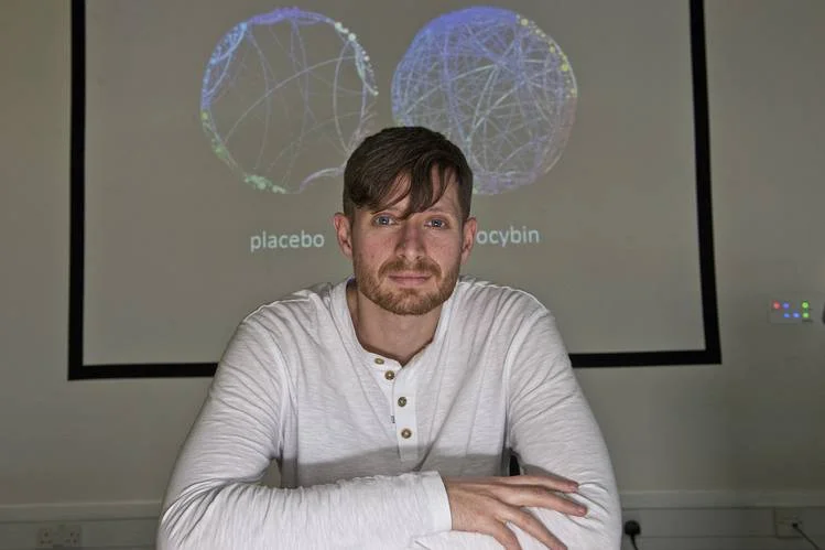 Neuroscientist Robin Carhart-Harris suggests that psychedelics can, in e$ect, ‘reboot’ the brain. PHOTO: FRANCESCO GUIDICINI/CAMERA PRESS/REDUX