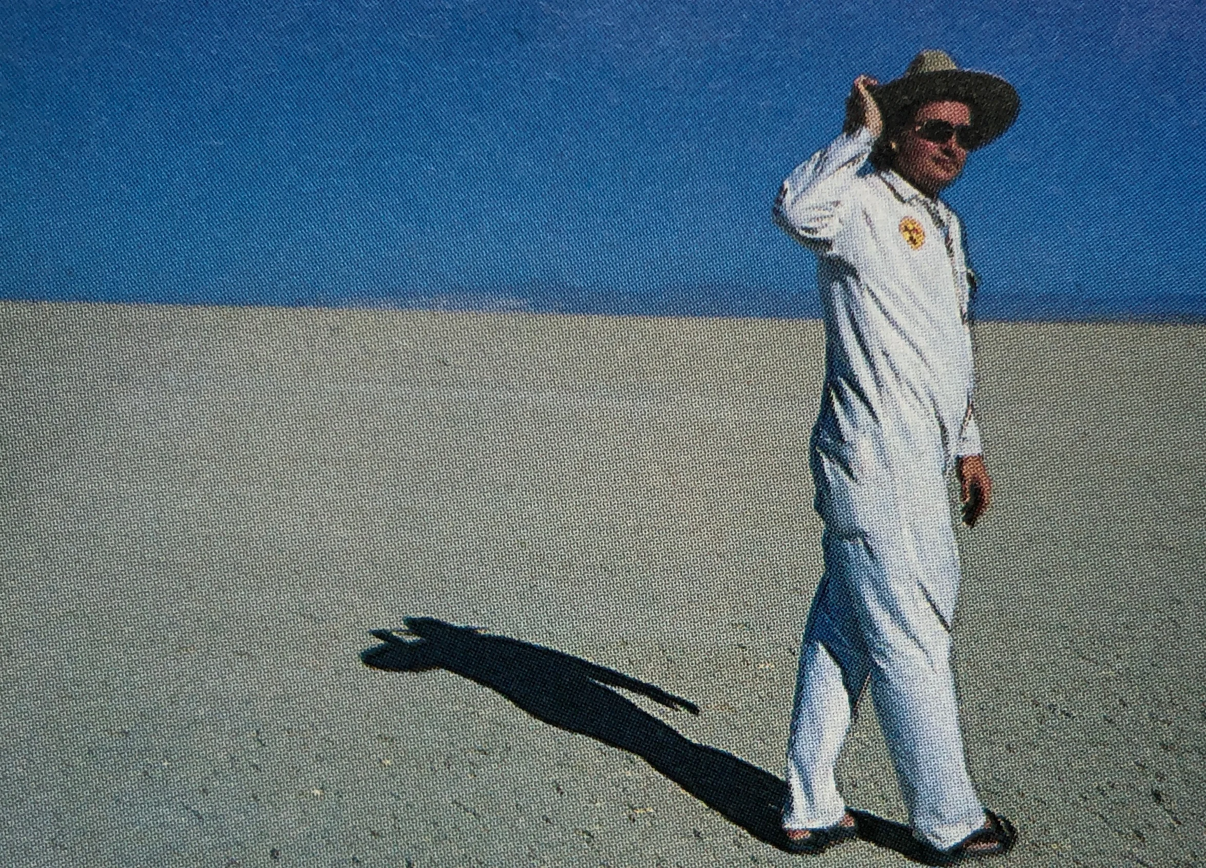 man in white suit.jpg