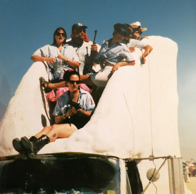 Disgruntled Postal Works on top of a Tom Kennedy art car