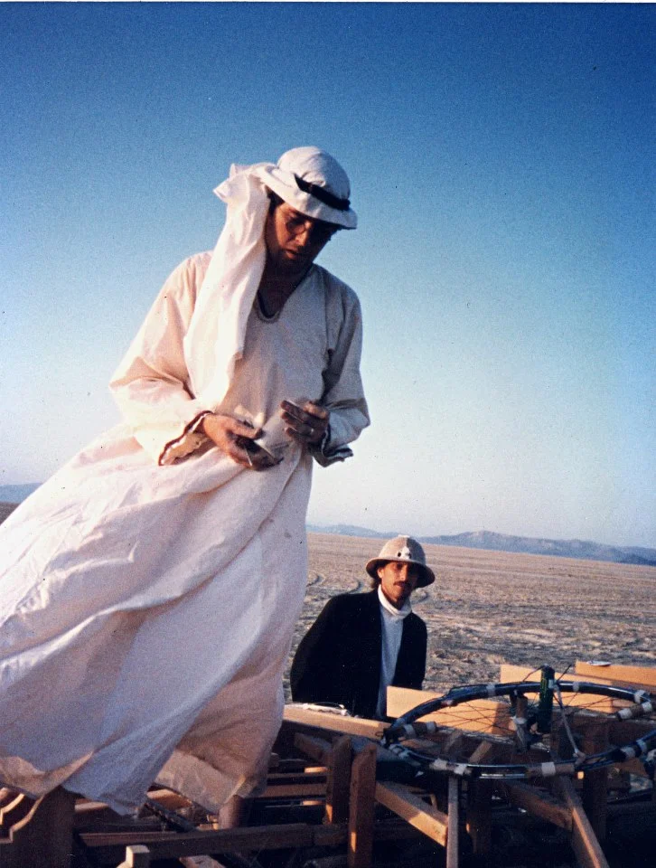Kimric Smythe rigs explosives to the Man and Dan Miller looks on