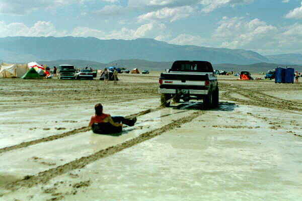 1995 being pulled behind truck in mud.jpg