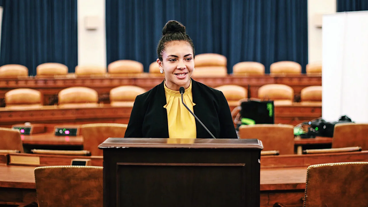 Milla Anderson speaking at Ways and Means Committee