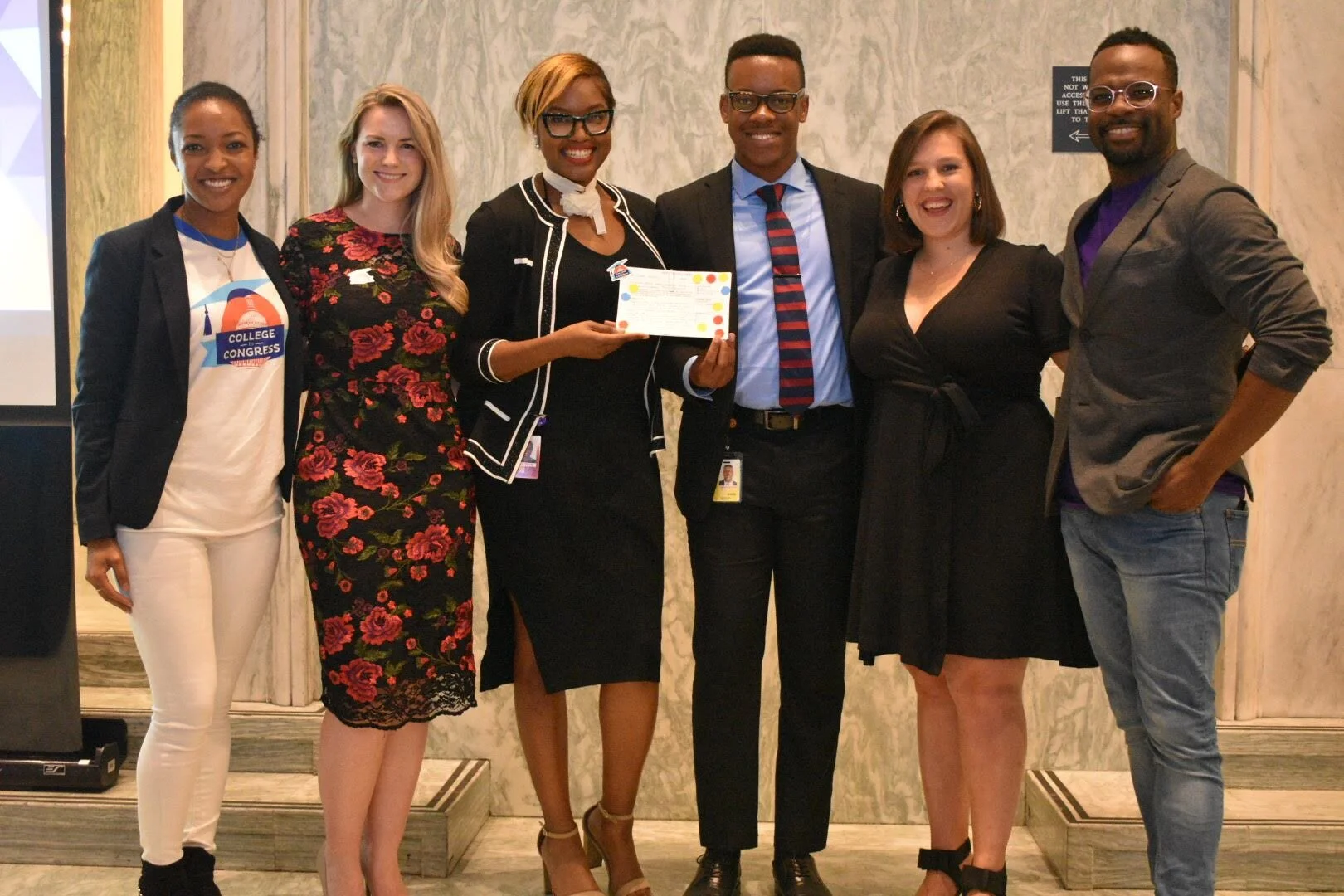 Left to right: Domonique James, Communications Director, College to Congress Audrey Henson, Founder & CEO, College to Congress Maya P., Student and public policy winner Onyx B., Student and public policy Winner Maria Giannopouloss, Google Civics Outreach Orie Ward, Executive Director, The Purple Aisle