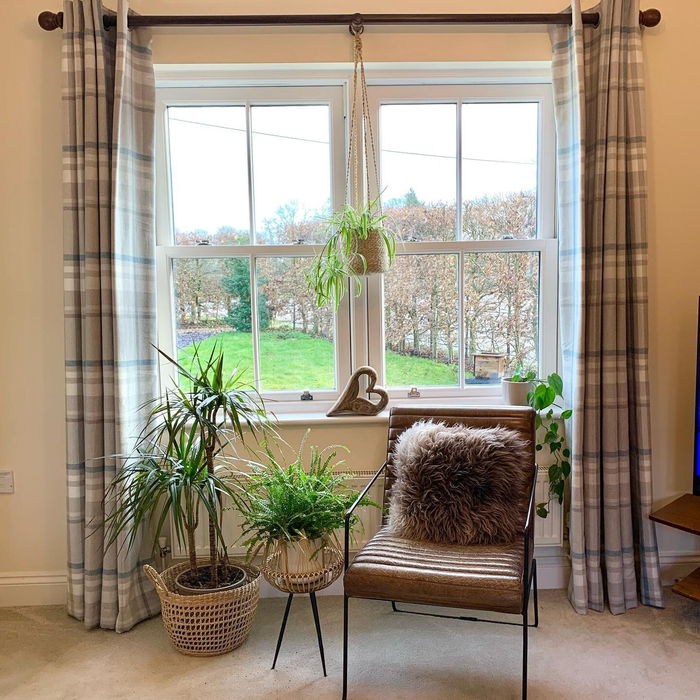 Textures, plants and fur....what a fab combo. 
This was a tricky window to dress but I think the mix of woven baskets, vintage leather and sheep skin work brilliantly together (if I do say so myself!) 
Topped off by lots of lovely plants at different