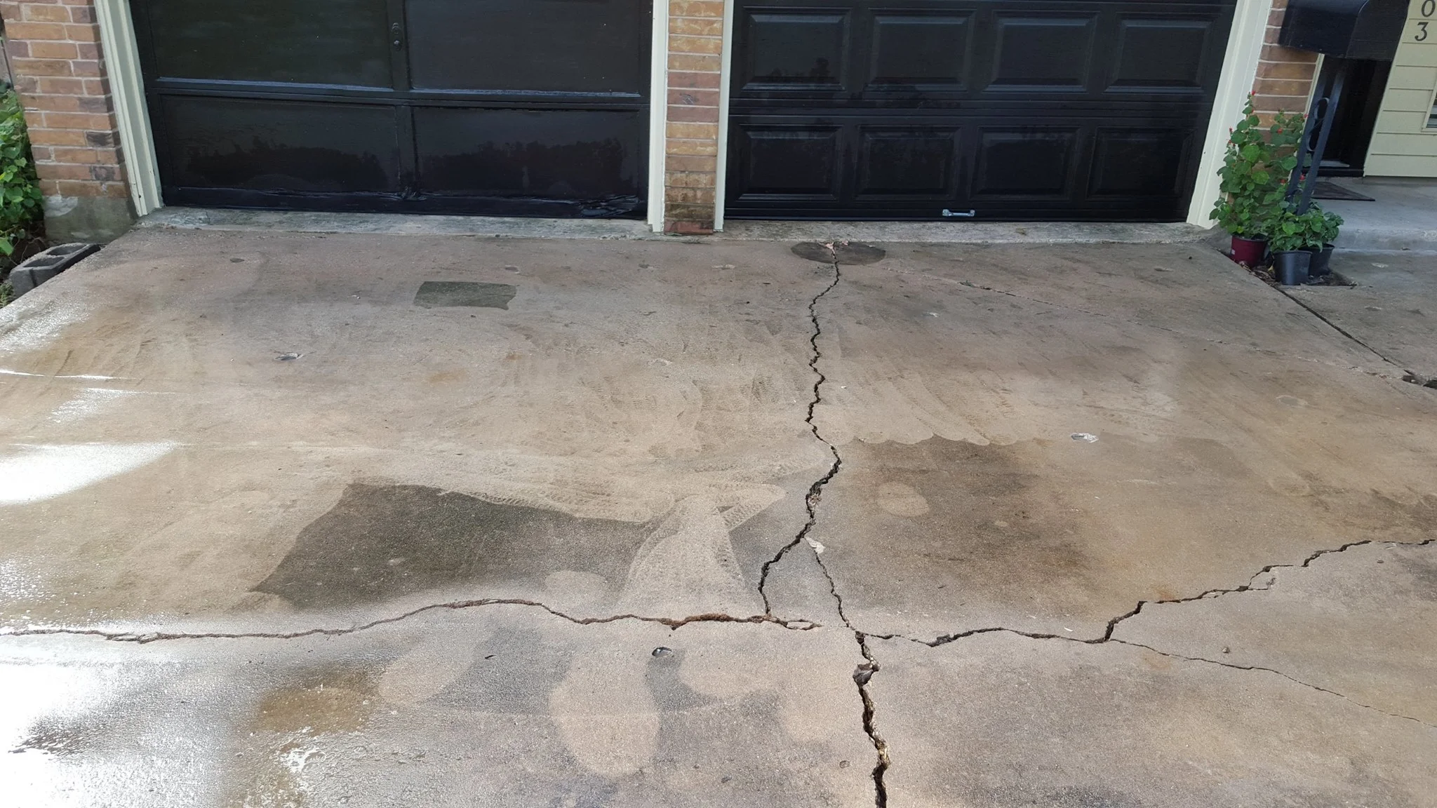 AFTER - The driveway was level and all voids filled.