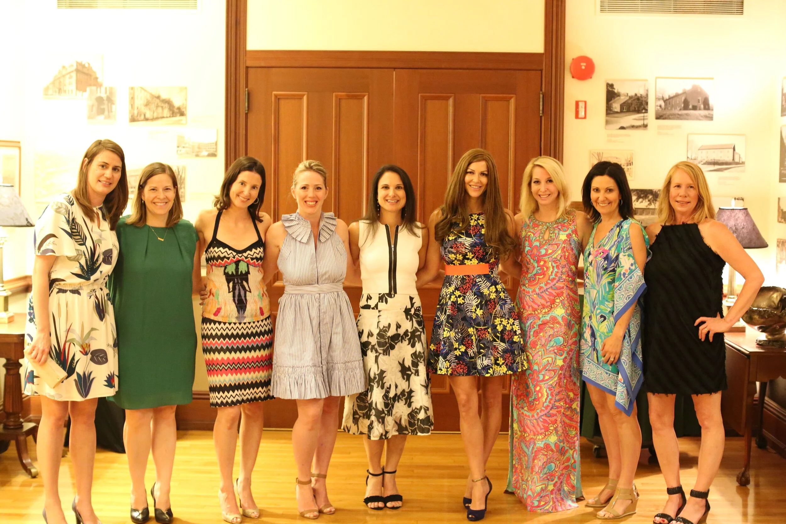 Current and former board members gather at the annual auction and cocktail party.