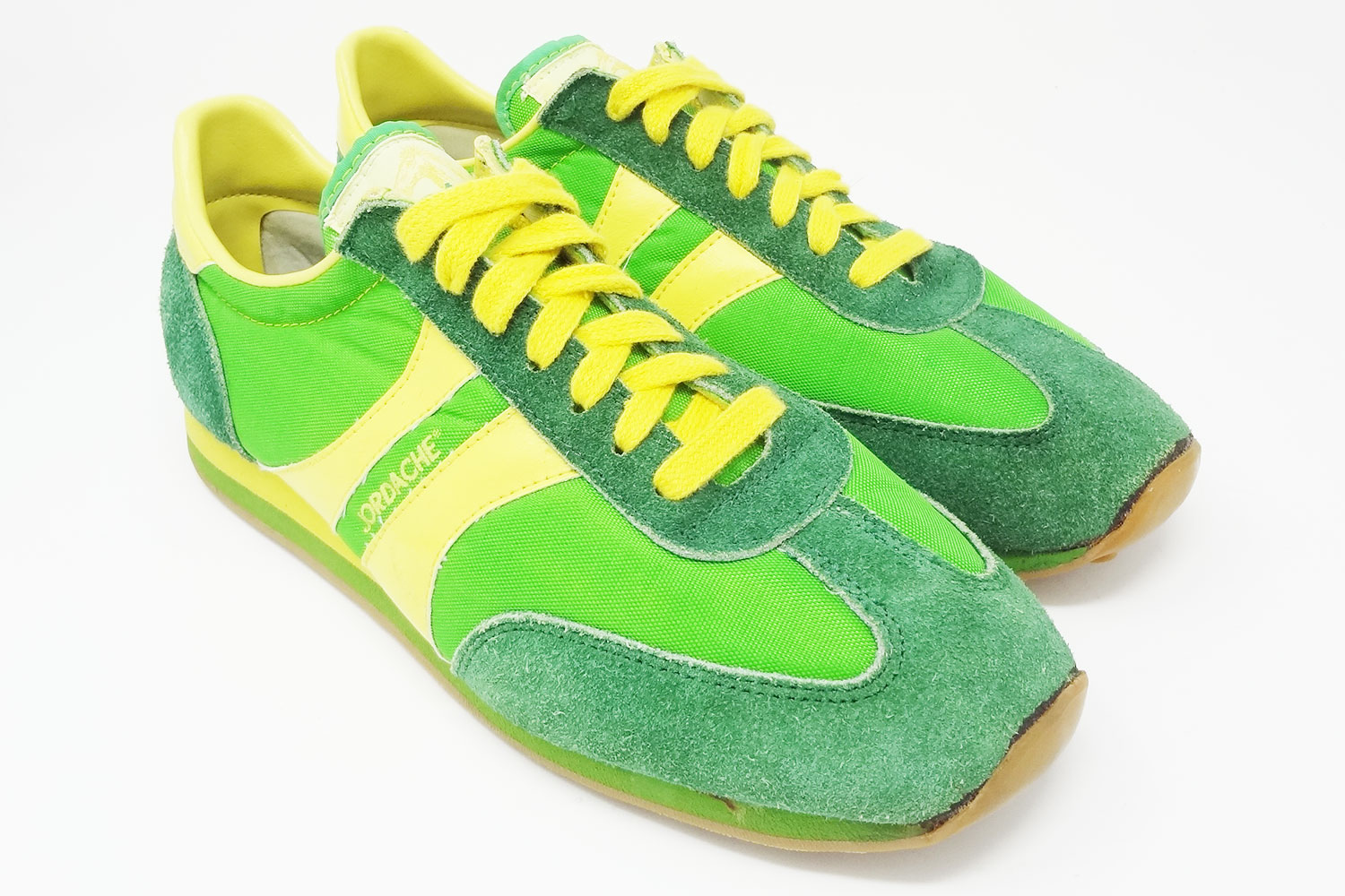 Jordache 1970s green and yellow brand deadstock vintage sneakers @ The Deffest