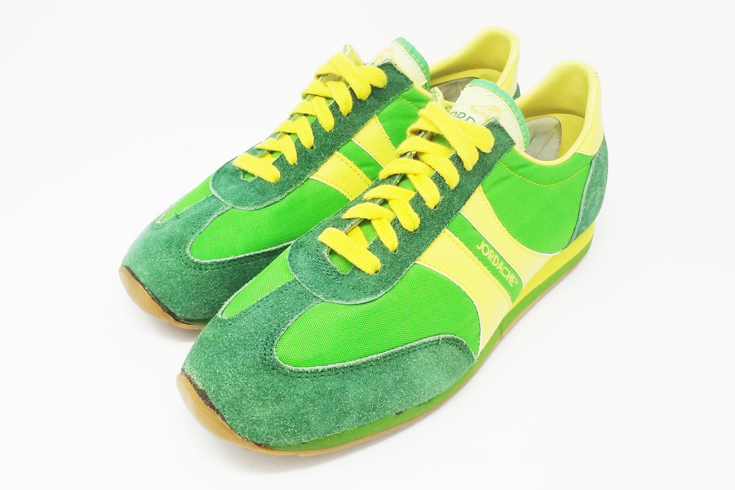 Old school 70s Jordache green and yellow vintage sneakers @ The Deffest