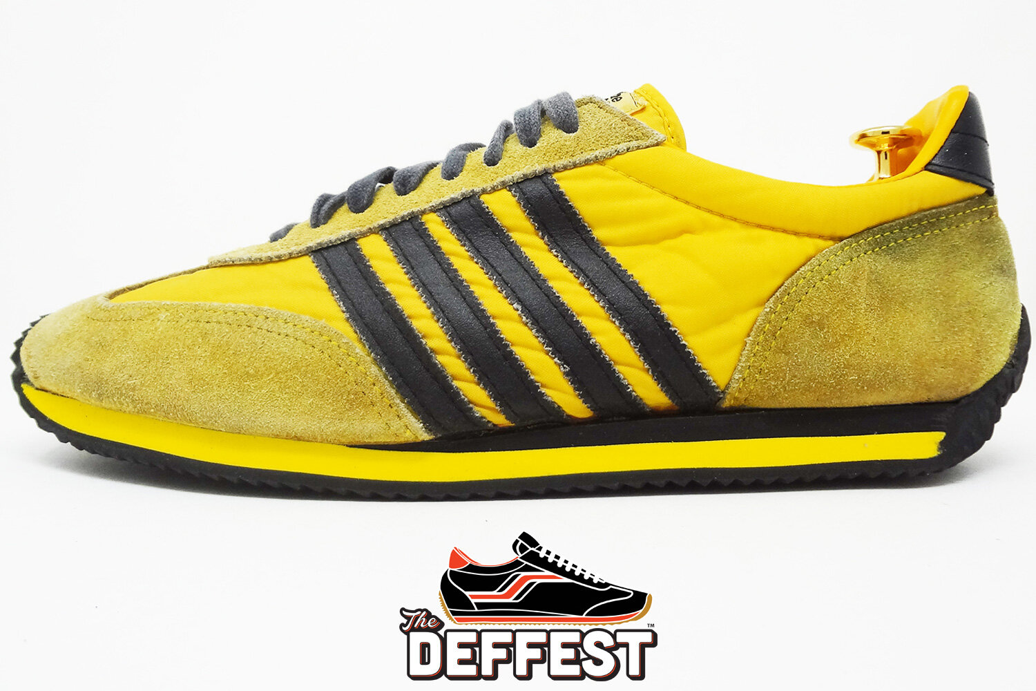 Sears The Winner yellow and black retro sneakers @ The Deffest