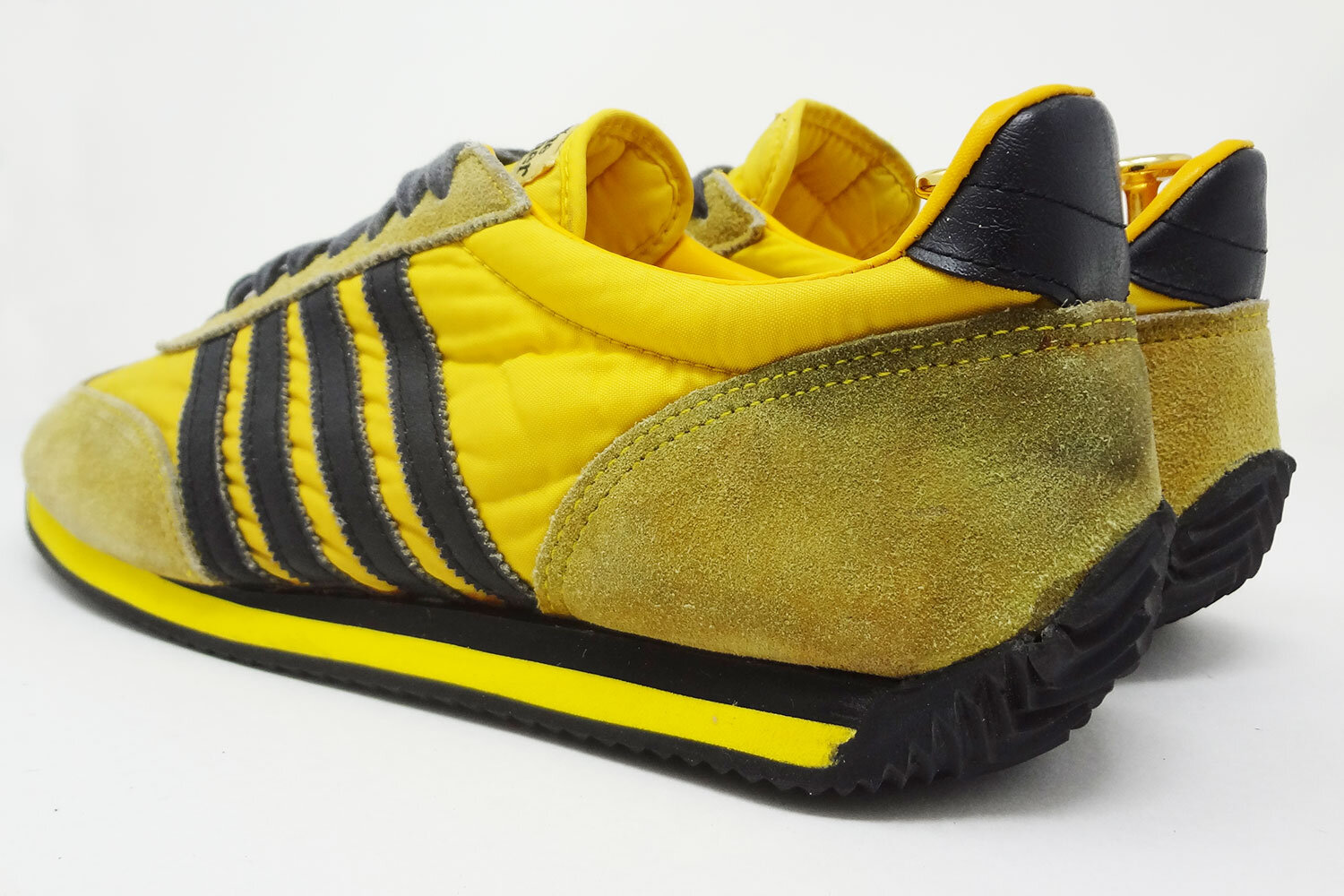 Sears The Winner yellow and black vintage sneaker sole repair @ The Deffest