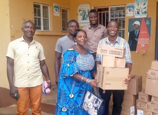 RYDO-program-manager-Joseph-Kobba-right-receiving-medical-supplies-from-Bread-and-Water-for-Africa-Sierra-Leone.jpg