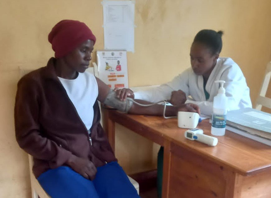 A-patient-gets-their-blood-pressure-checked-at-the-Kebeneti-Clinic.jpg