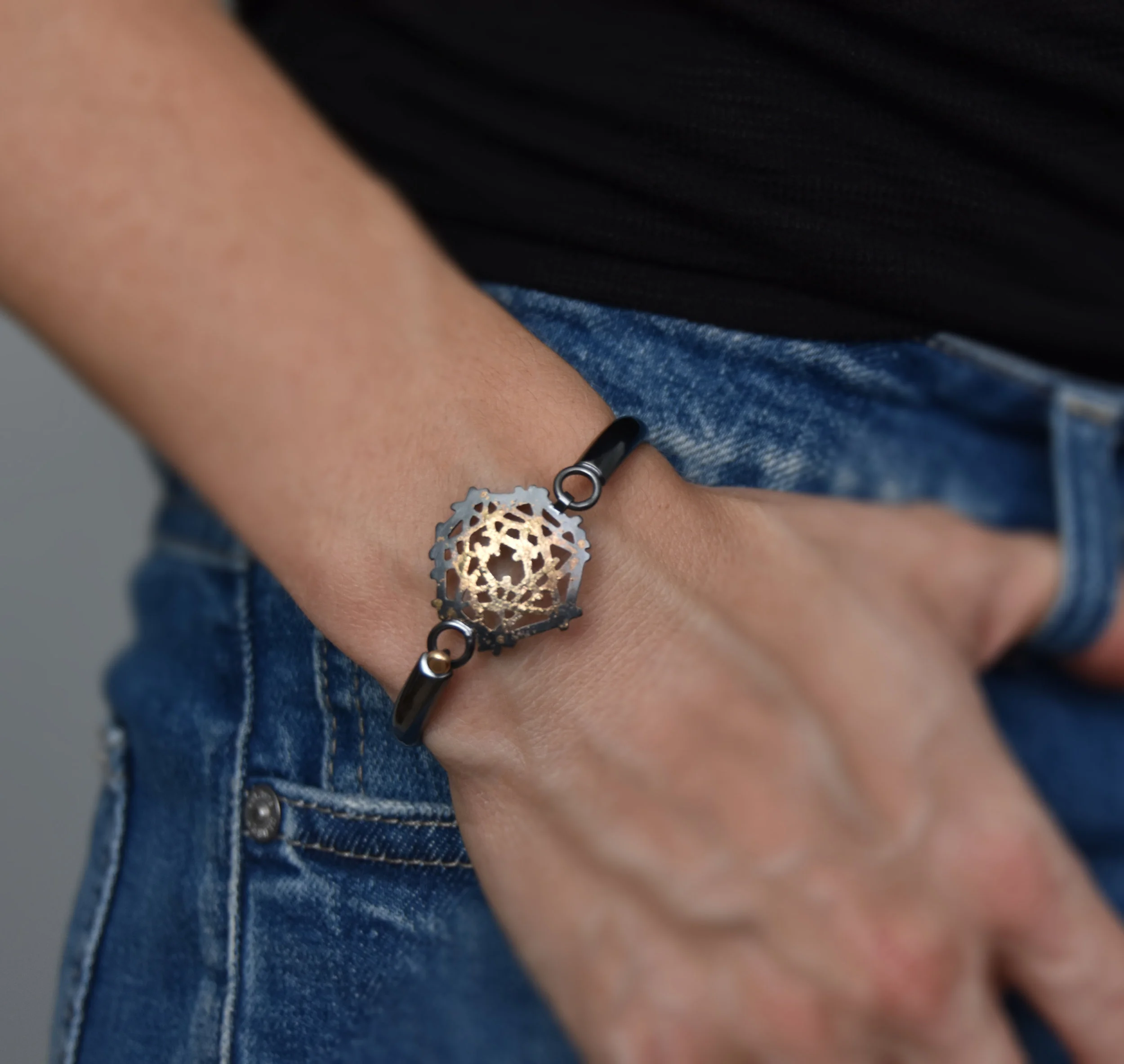 stickandstonecuffwithgolddetailselfie.jpg