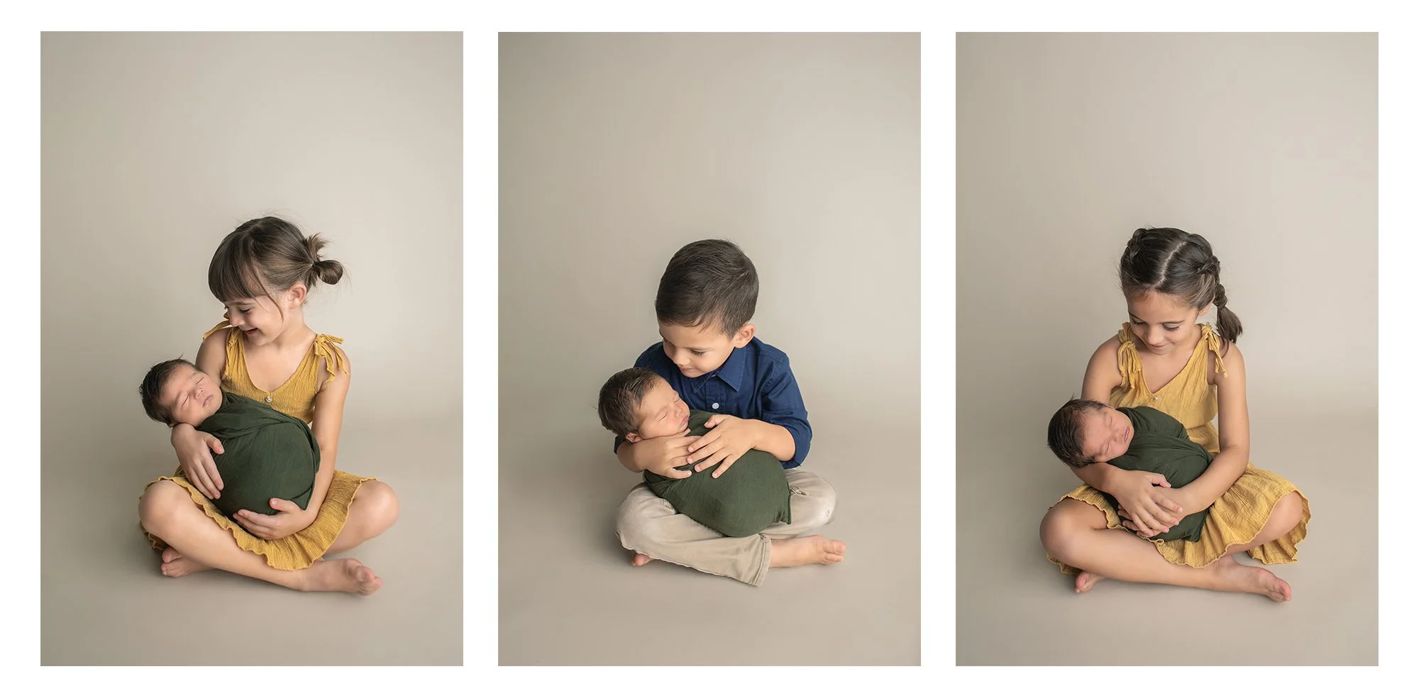 Sister and brother holding baby boy in newborn photo studio in Ponte Vedra FL. Sisters in mustard yellow dresses, brother in navy blue