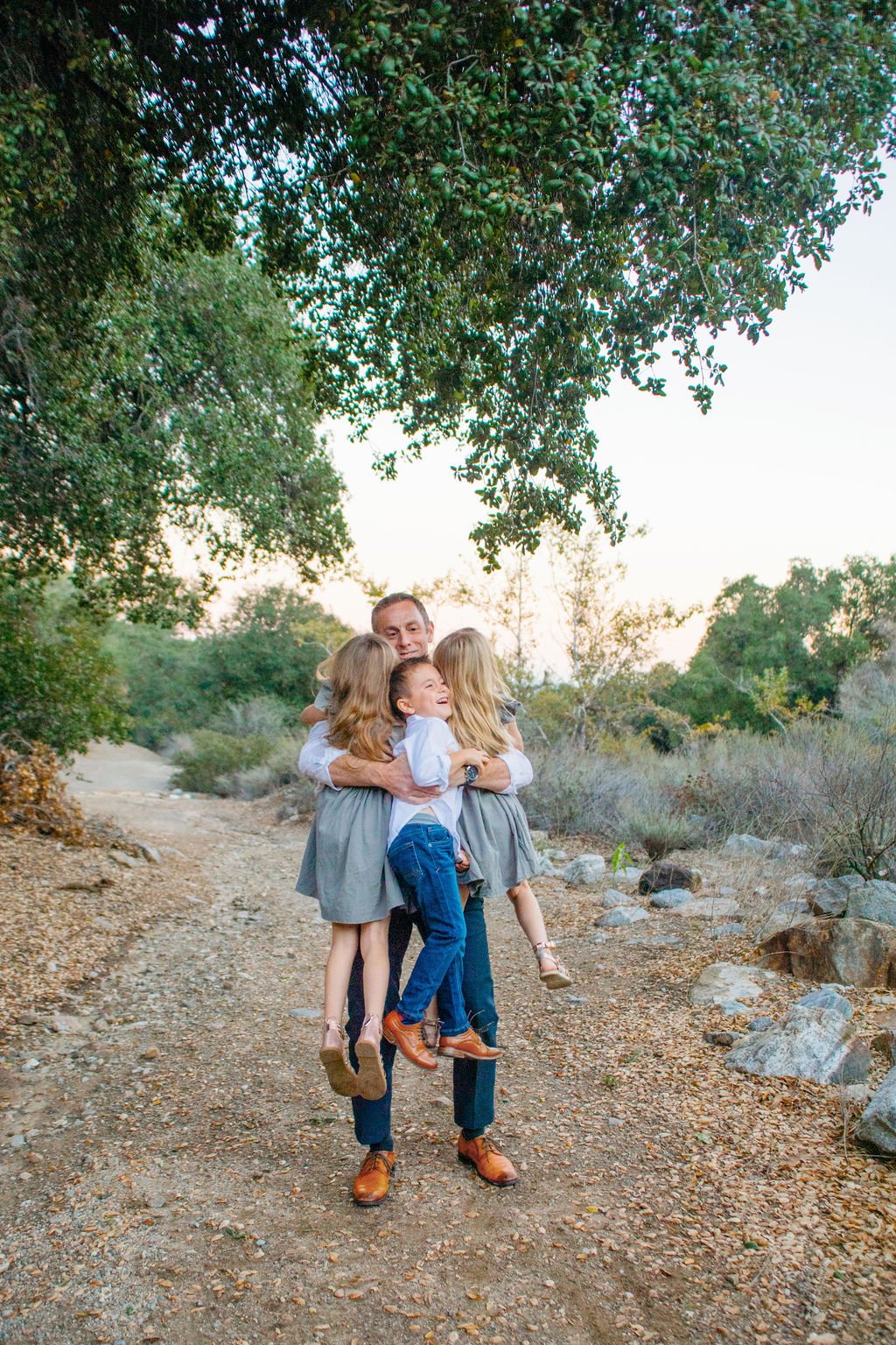 St. Augustine FL family photo shoot with best baby photographer in natural light with dad and kids