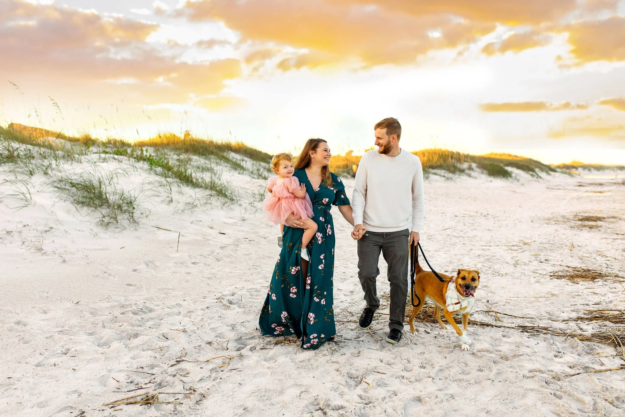 Family photo shoot in Jacksonville, FL at Hannah State Park at the beach with a dog and toddler at sunset with best photographer