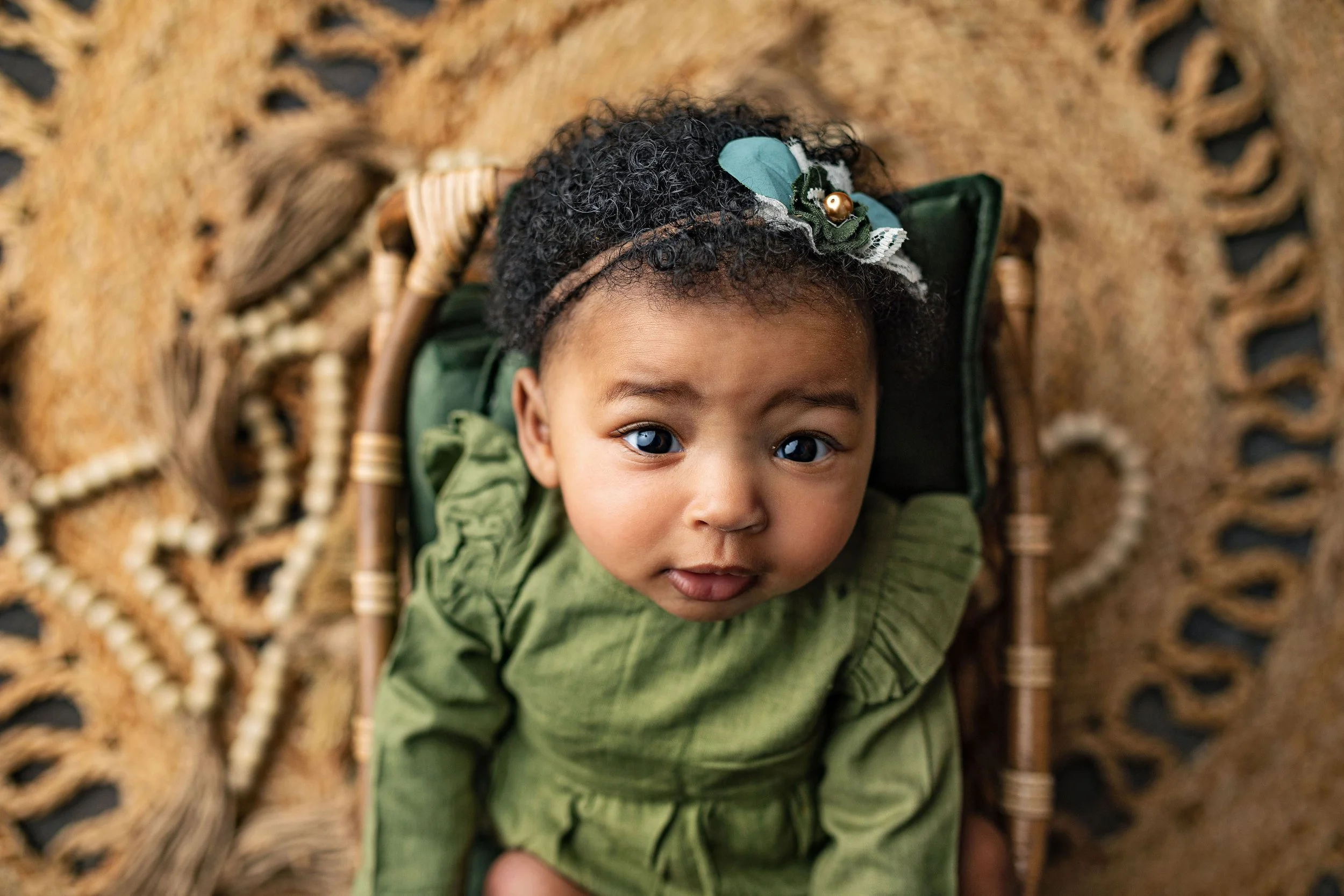 African american baby girl with earth tones and organic props with best milestone photographer in Jackasonville, FL 32092