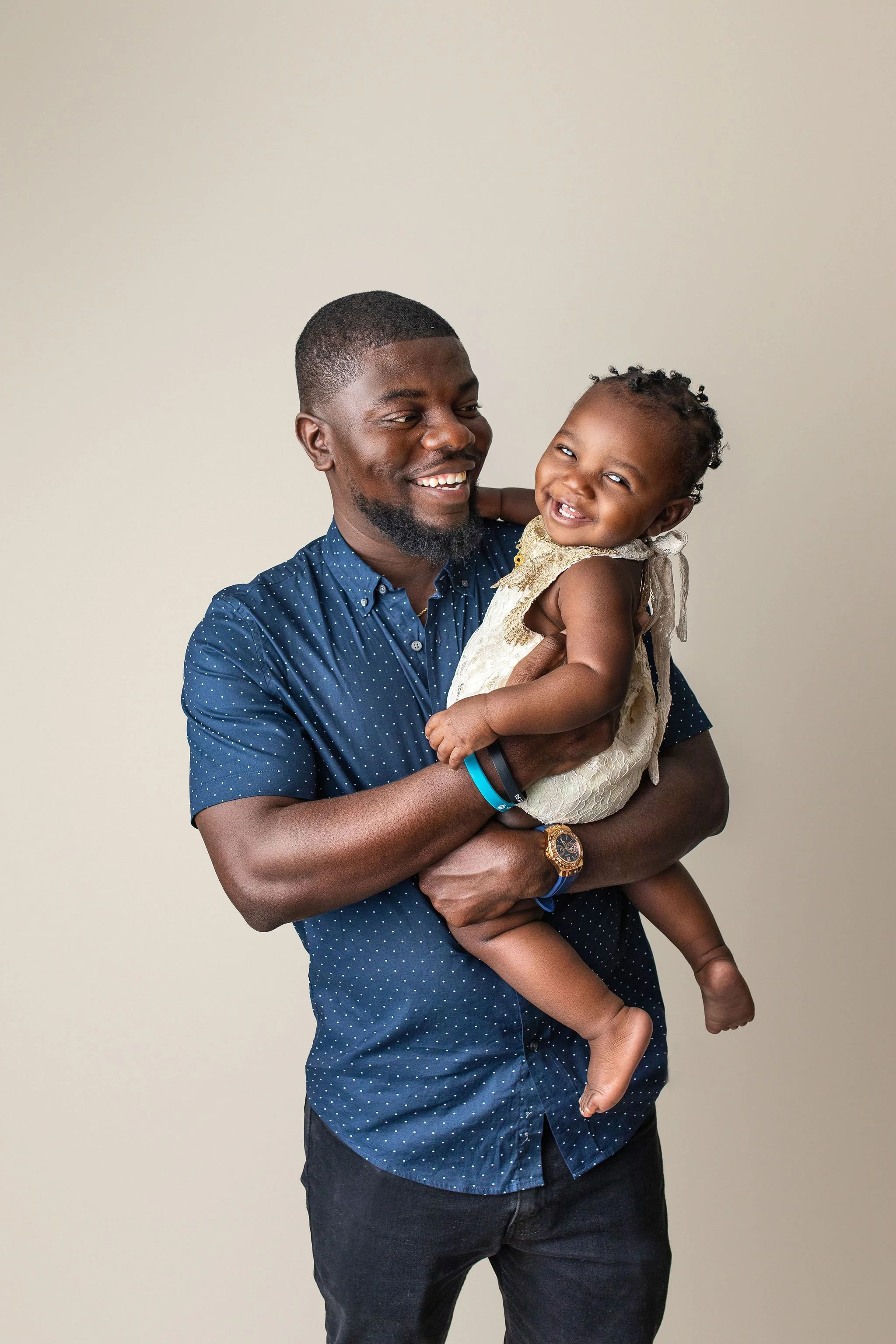 Daddy daughter photo shoot in JAX Beach florida with high end fine art photographer and black family portrait session