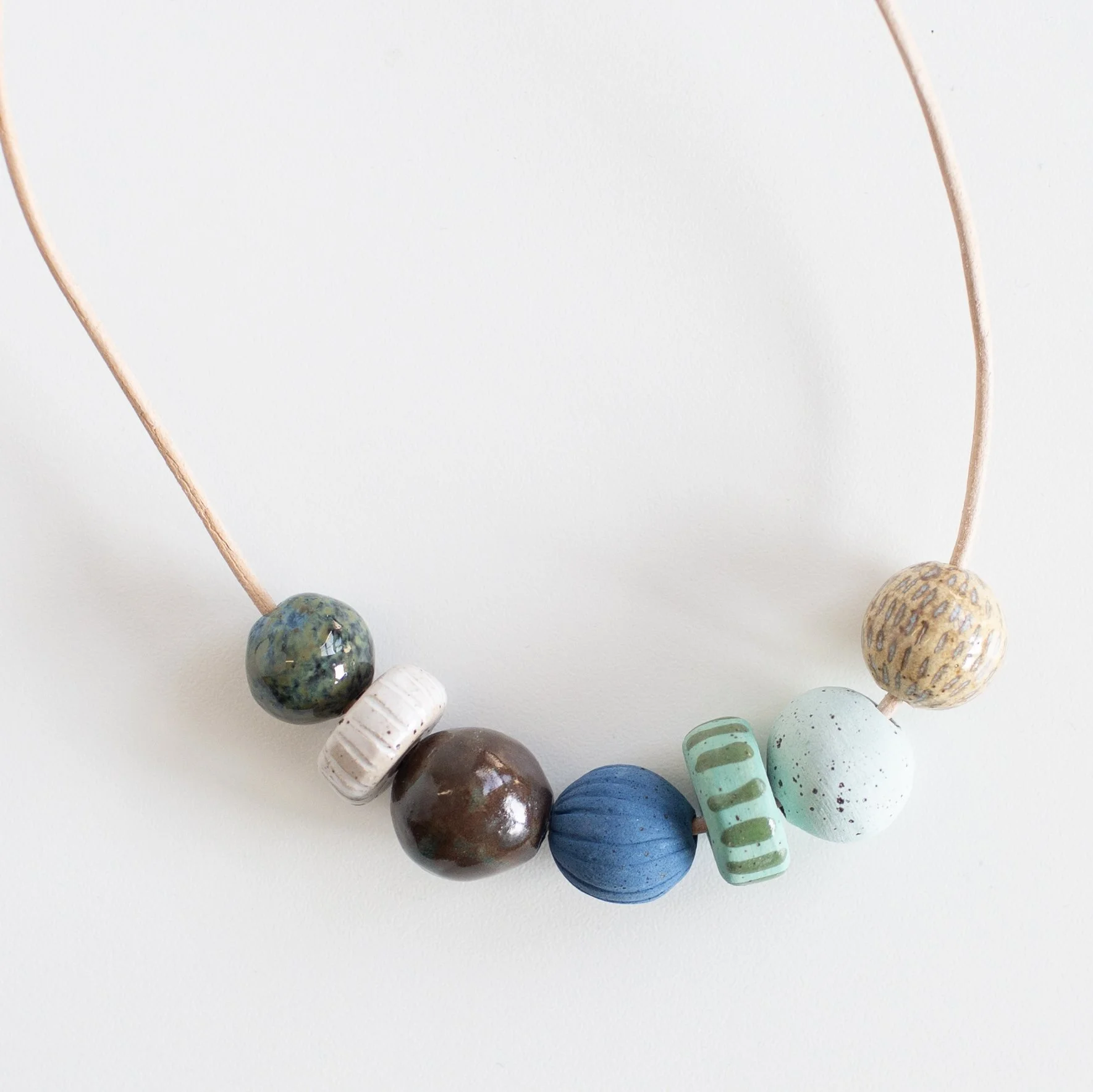 a mano-louisa podlich-ceramic-clay-pottery-beads-necklace-handmade-3.jpg