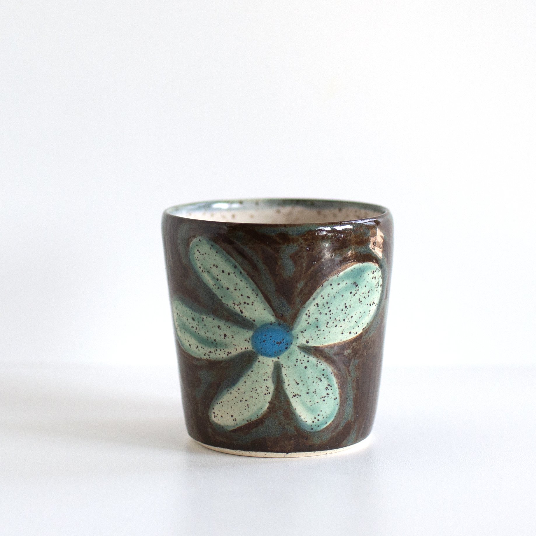a mano-louisa podlich-clay-ceramic-pottery-wheel thrown-mug-handmade-flower-cup-1.2.jpg