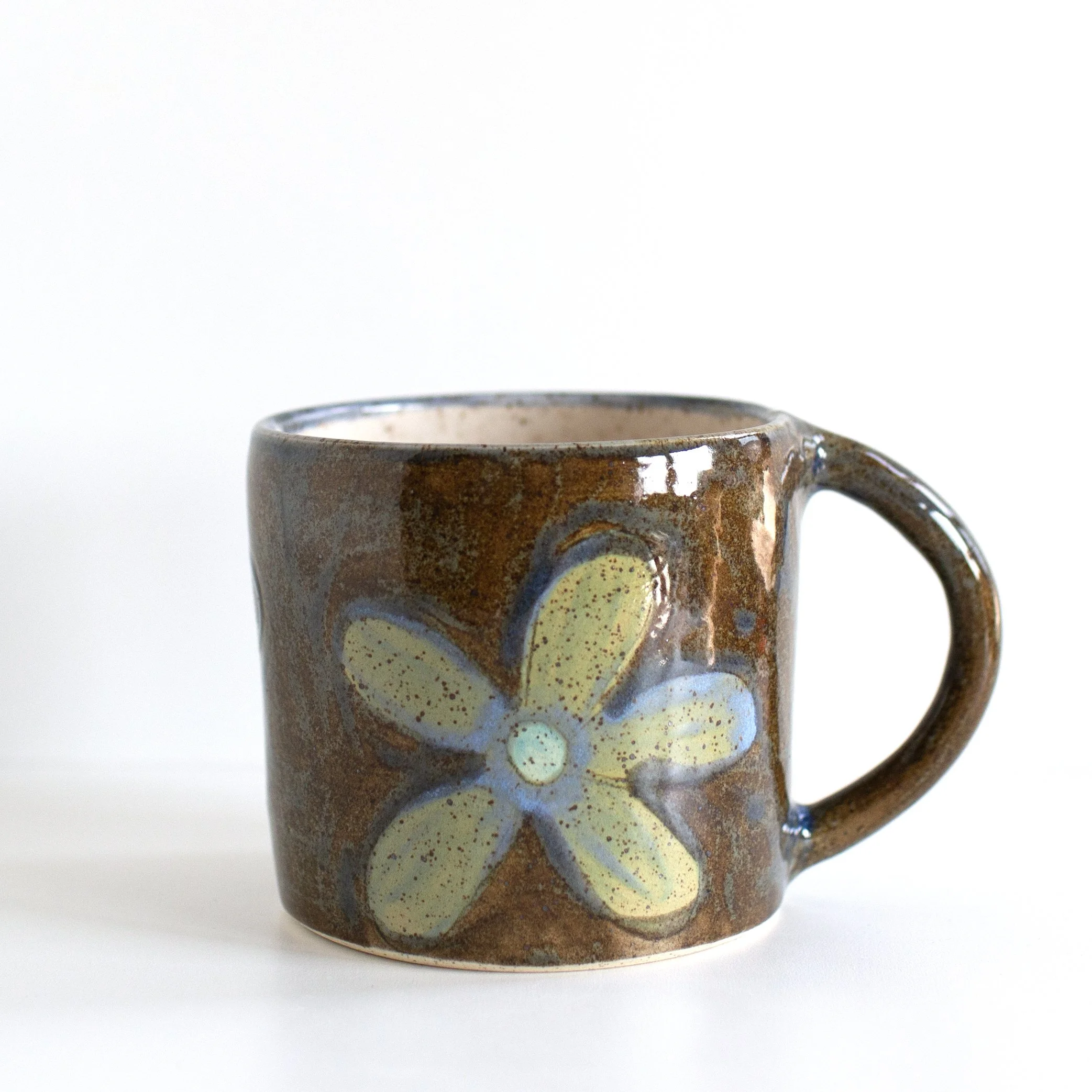 a mano-louisa podlich-clay-ceramic-pottery-wheel thrown-mug-handmade-flower-mug-1.1.jpg