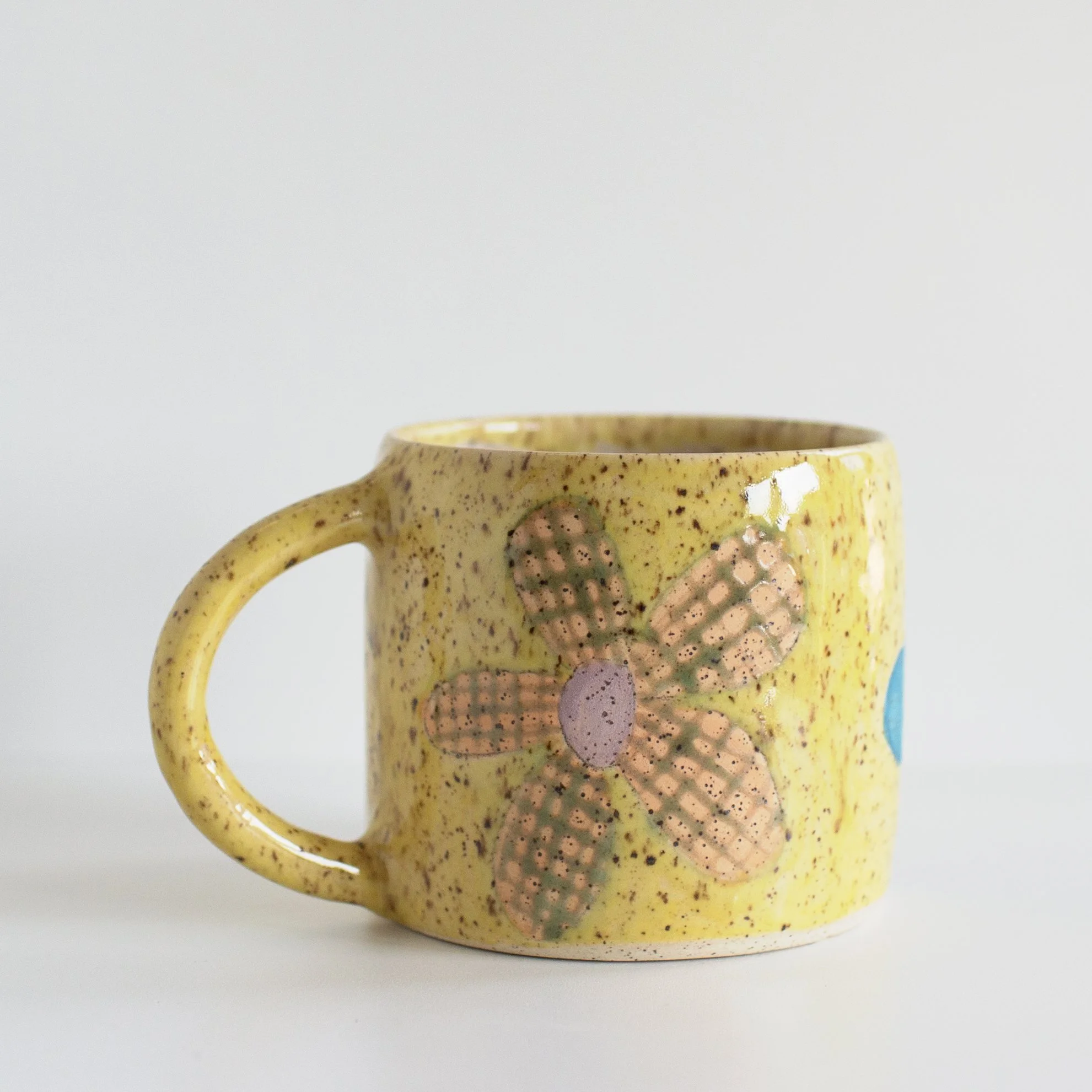 a mano-louisa podlich-clay-ceramic-pottery-wheel thrown-mug-handmade-flower-mug-2.1.jpg