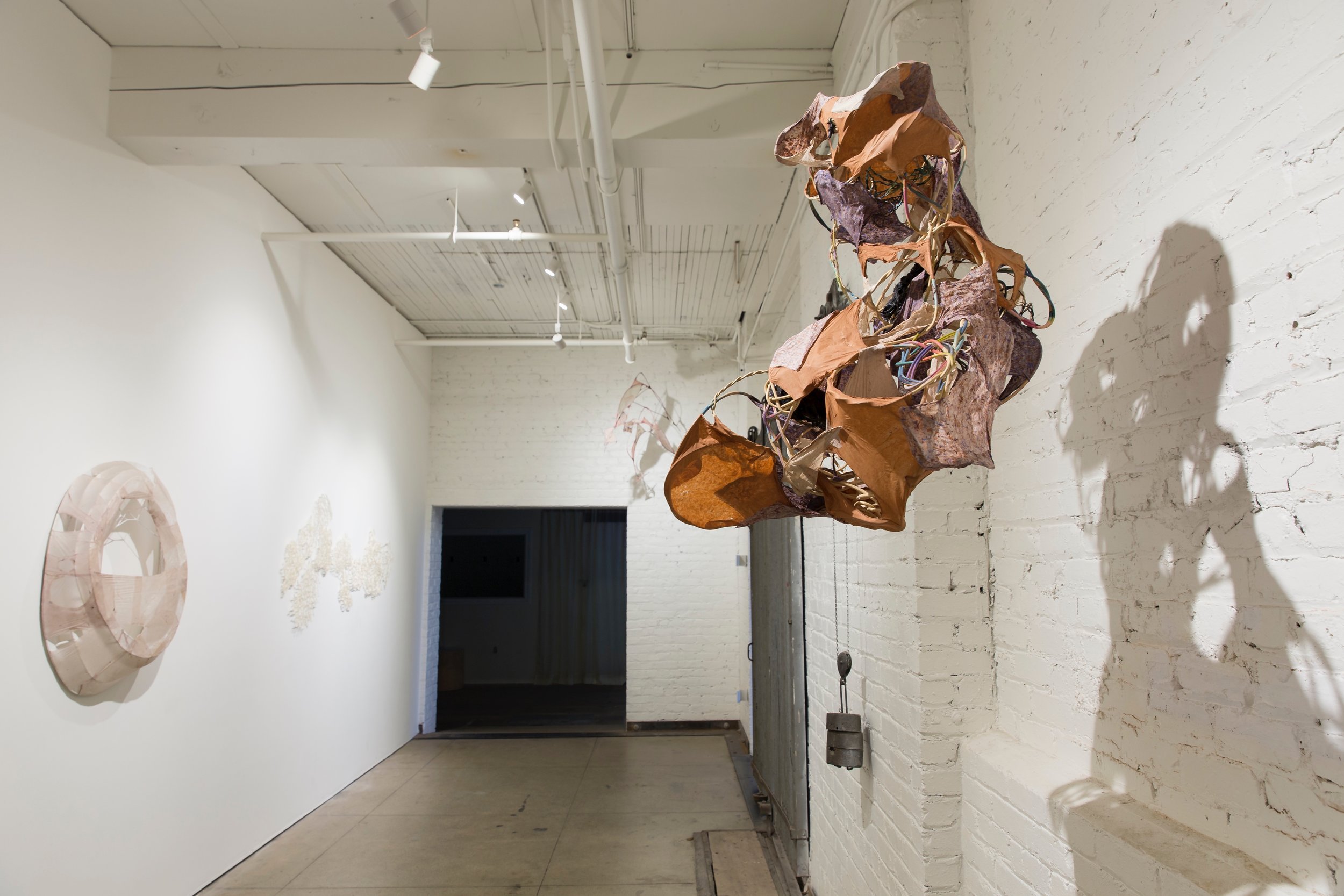  “Torso” in foreground, “Hollow Bone” in background 