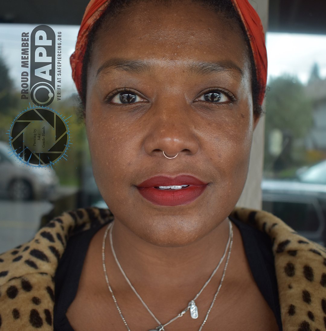 This lovely lady came in knowing that she wanted something subtle her septum piercing and after going over all her options, she decided that a rose gold fixed bead ring from BVLA would be perfect! With the ability .jpg