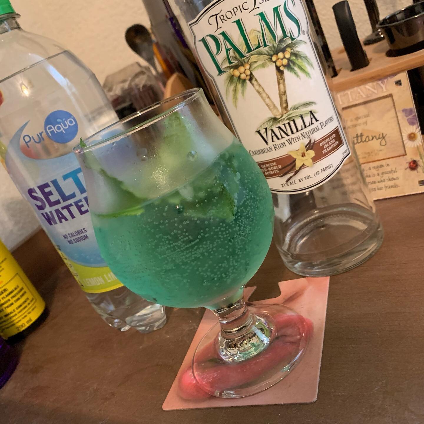 Our Flag Means Death with a Stede and a Blackbeard

Captain Stede:
&bull;2oz vanilla rum
&bull;.5oz Creme de menthe
&bull;.5oz simple syrup
&bull;Top with lime club soda
&bull;Garnish with muddled mint leaves

Captain Blackbeard:
&bull;2oz Black Baca