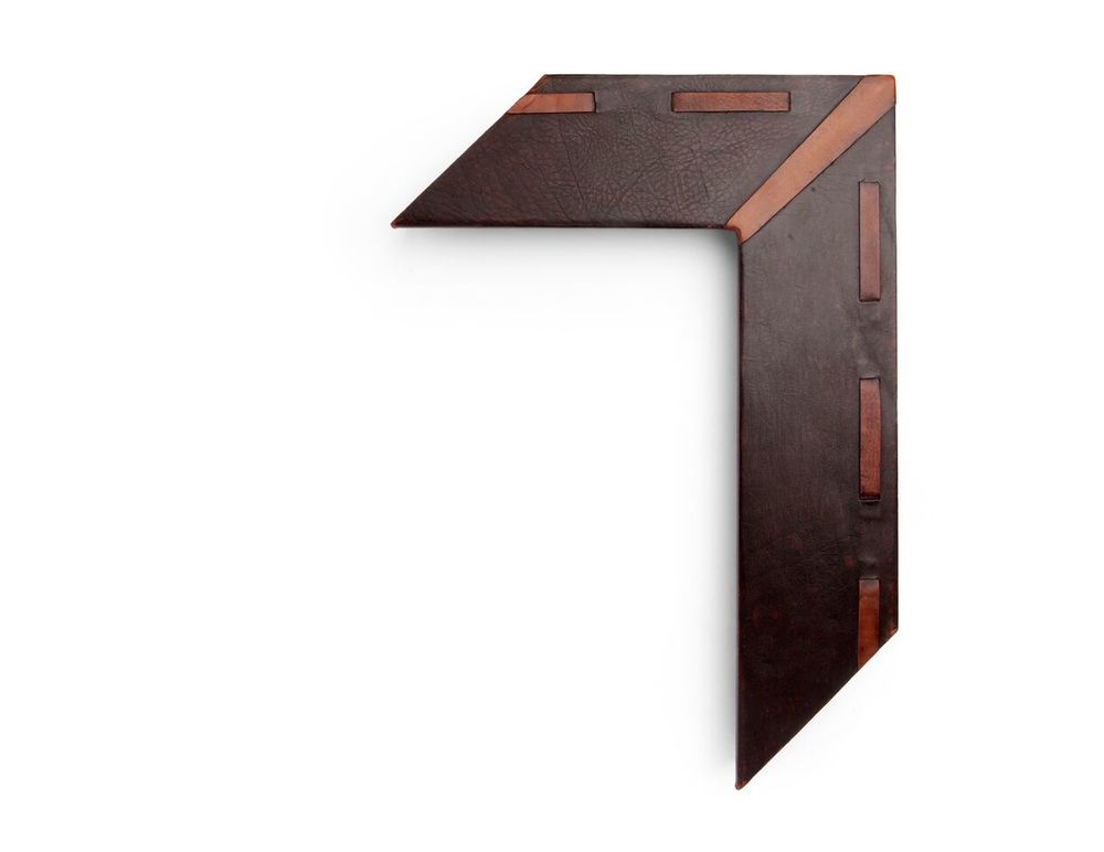Tan Single Strip A 4 inch leather-wrapped frame, with a wide single strip of lighter tan leather stitched in alternating sections over the natural tooled leather panel. There are many finishes and leathers to choose from, and no two are exactly alike.
