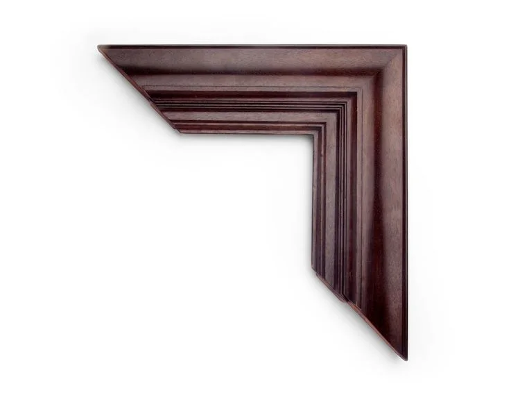 Mahogany Dutch Panel A 4 inch Dutch-style frame in mahogany, with a wide reverse ogee outside, and inner architectural paneling. The finish shown is a classic brown stain over mahogany.