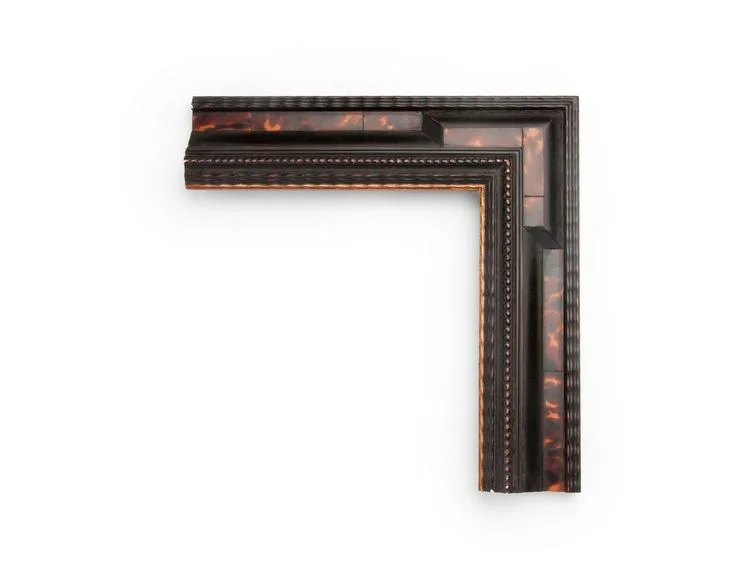 Beaded Tortoiseshell A 3 inch Dutch-style frame, with brown tortoiseshell veneer panels, outer and inner sections of ripple and bead decoration, and an inner architectural keyed corner. The finish shown is black over red clay, with yellow gold along the inner lip.