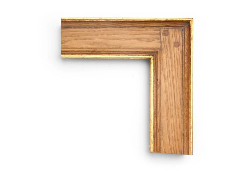 Gilded Stained Oak A 3-1/2 inch hardwood frame in oak, with an Arts and Crafts stained panel and pegged corner, and inner and outer gilded edges.