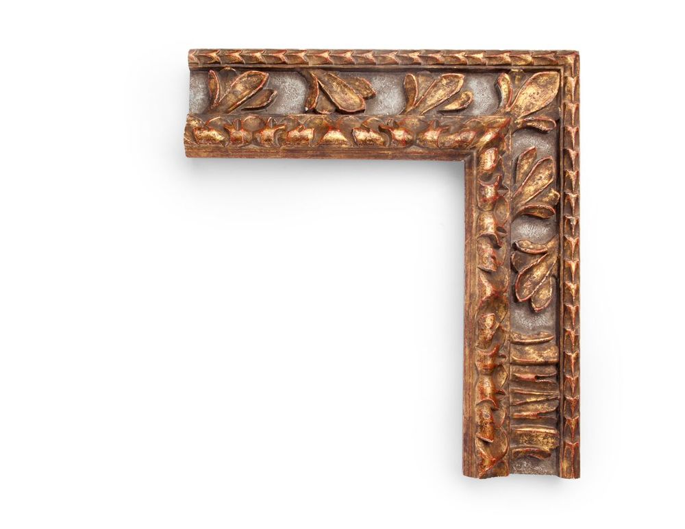 Fleur-de-lis Petal Center A Spanish 4-1/4 inch frame, with high relief carved fleur-de-lis corner, stacked petal center, alternating floral carvings along a center panel, carved floral designs all along the high inner lip, and overlaid laurel patterns along the outer edge. The finish shown is an antiqued light blue over yellow gold with heavy distressing and a red clay.