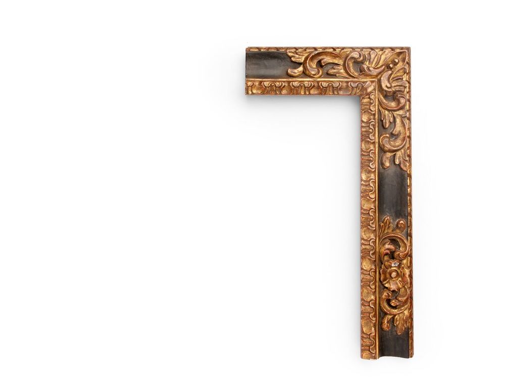 Carved Scooped Petal A Spanish 3 inch 17th-century frame, with high relief gilded floral carvings at the corner & center, on a reverse scooped outer black panel with hand-tooling, and a tall inner lip of petal carving. The finish shown is black panel and yellow gold with an antique finish and red clay.