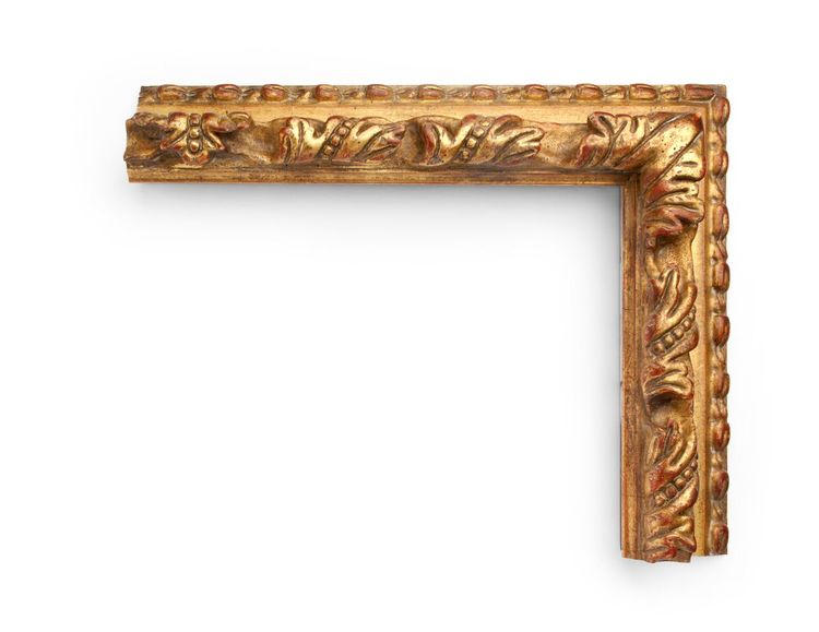 Antique Carved Lip An Italian 3-1/2 inch frame, with a high inner lip with continuous carving in a floral-and-bead style, scooping underneath to an outer lip of carved decoration. The finish shown is yellow gold with an antique finish and a red clay, and can be customized.