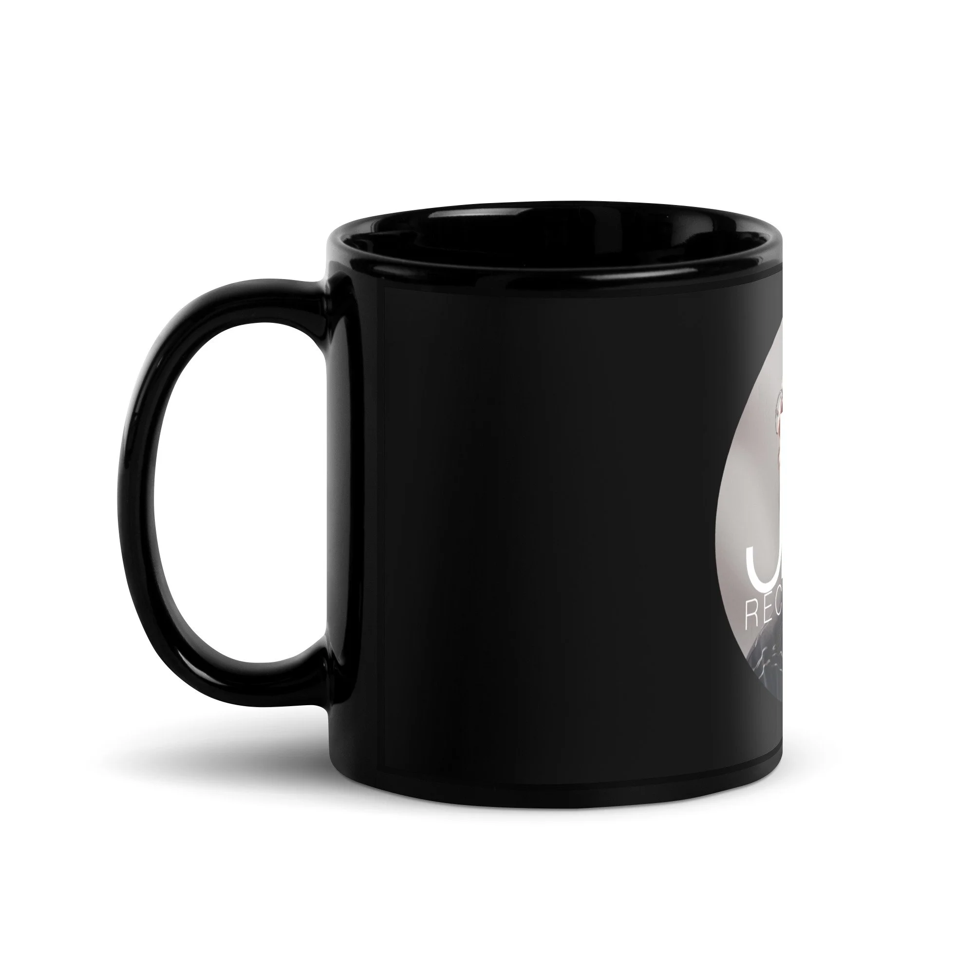 black-glossy-mug-black-11-oz-handle-on-left-65f30a06e2c64.jpg