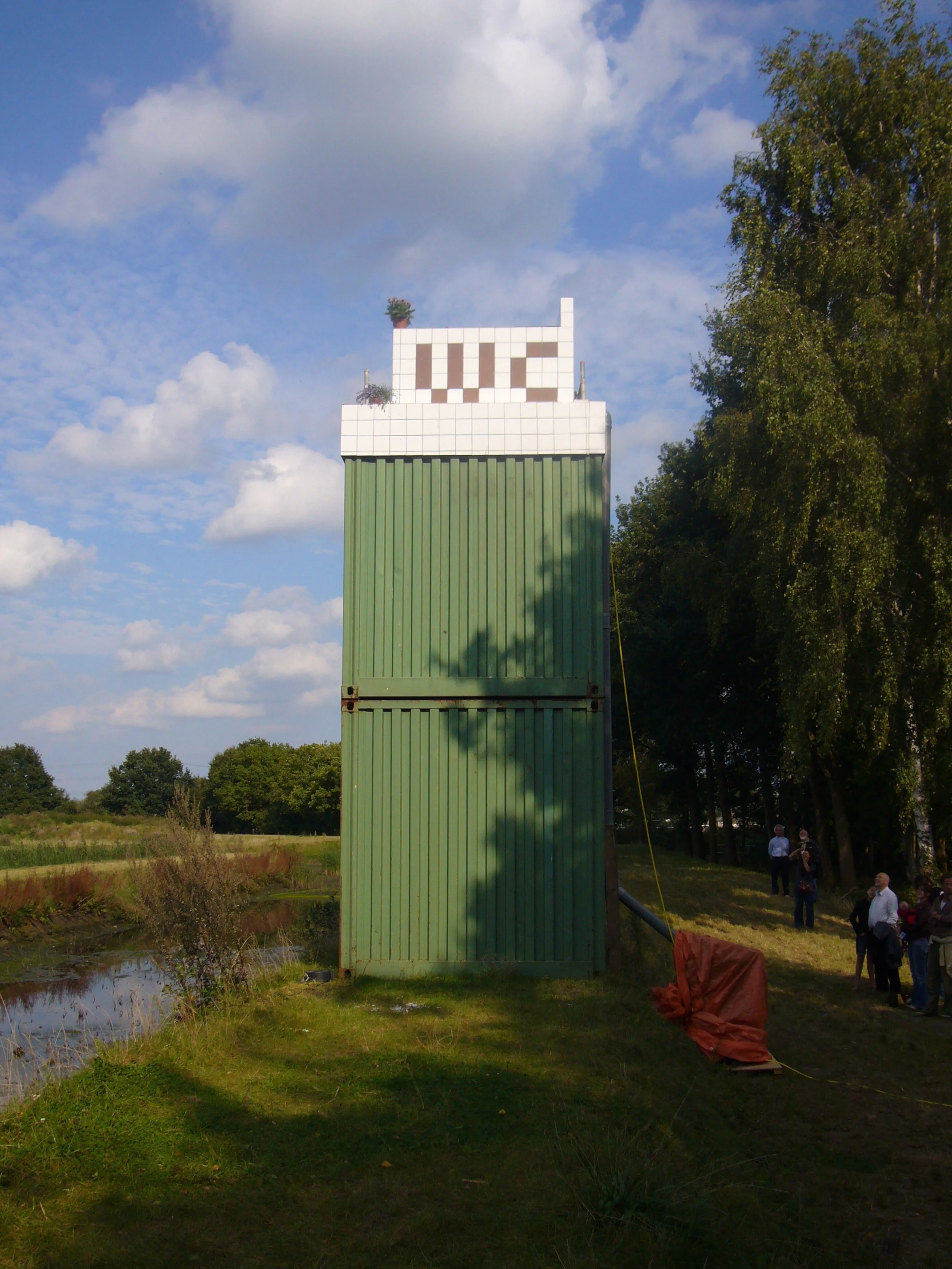  TOILET TOWER  A tower with a toilet on top, placed on a former water treatment site. Doing your needs at a height of 10 meters with a view on where it used to end up 
