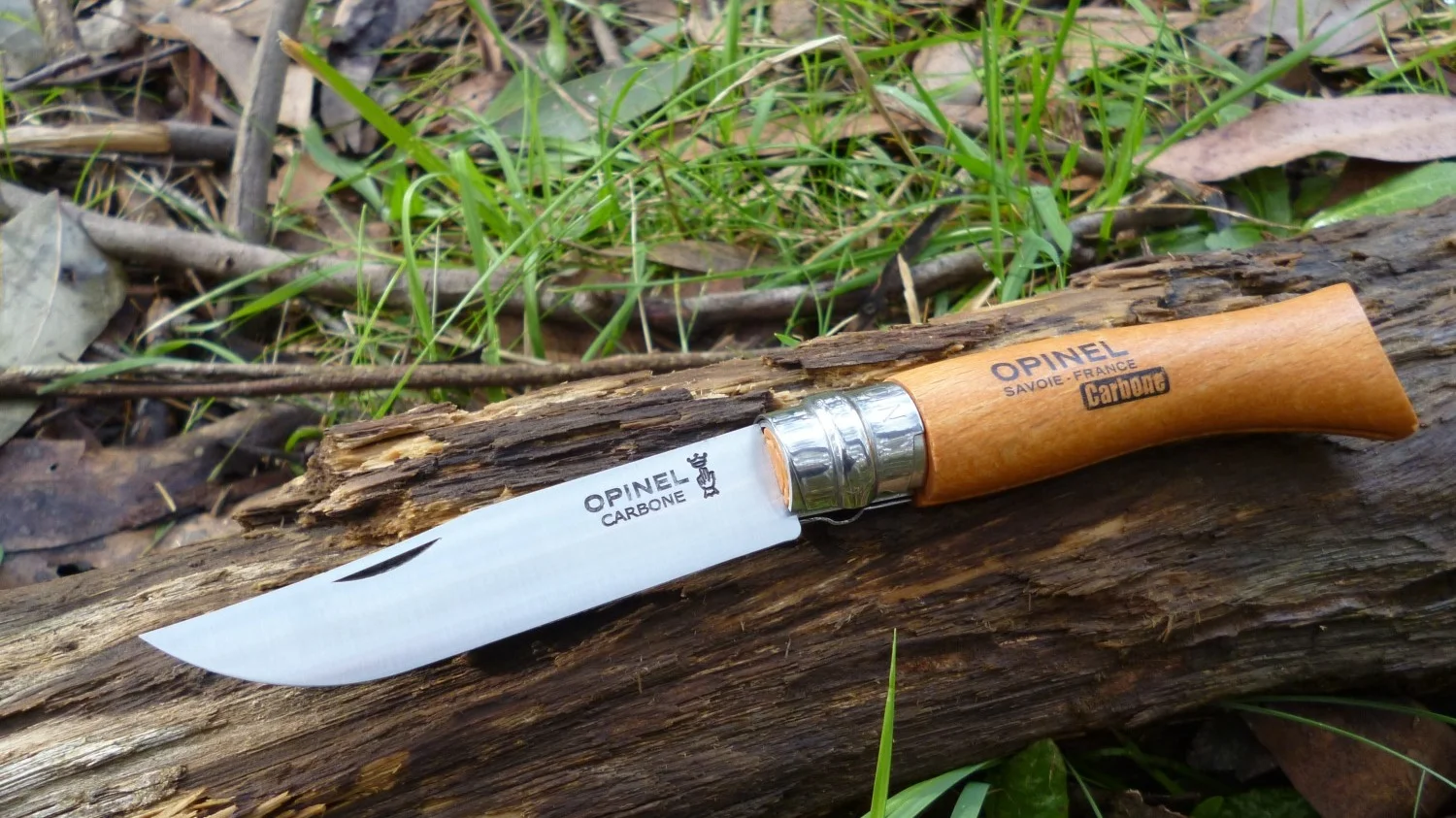 The carbon steel blade shown in the photo is near new so looks spotless. But rest assured it is likely to start showing signs of corrosion of time.