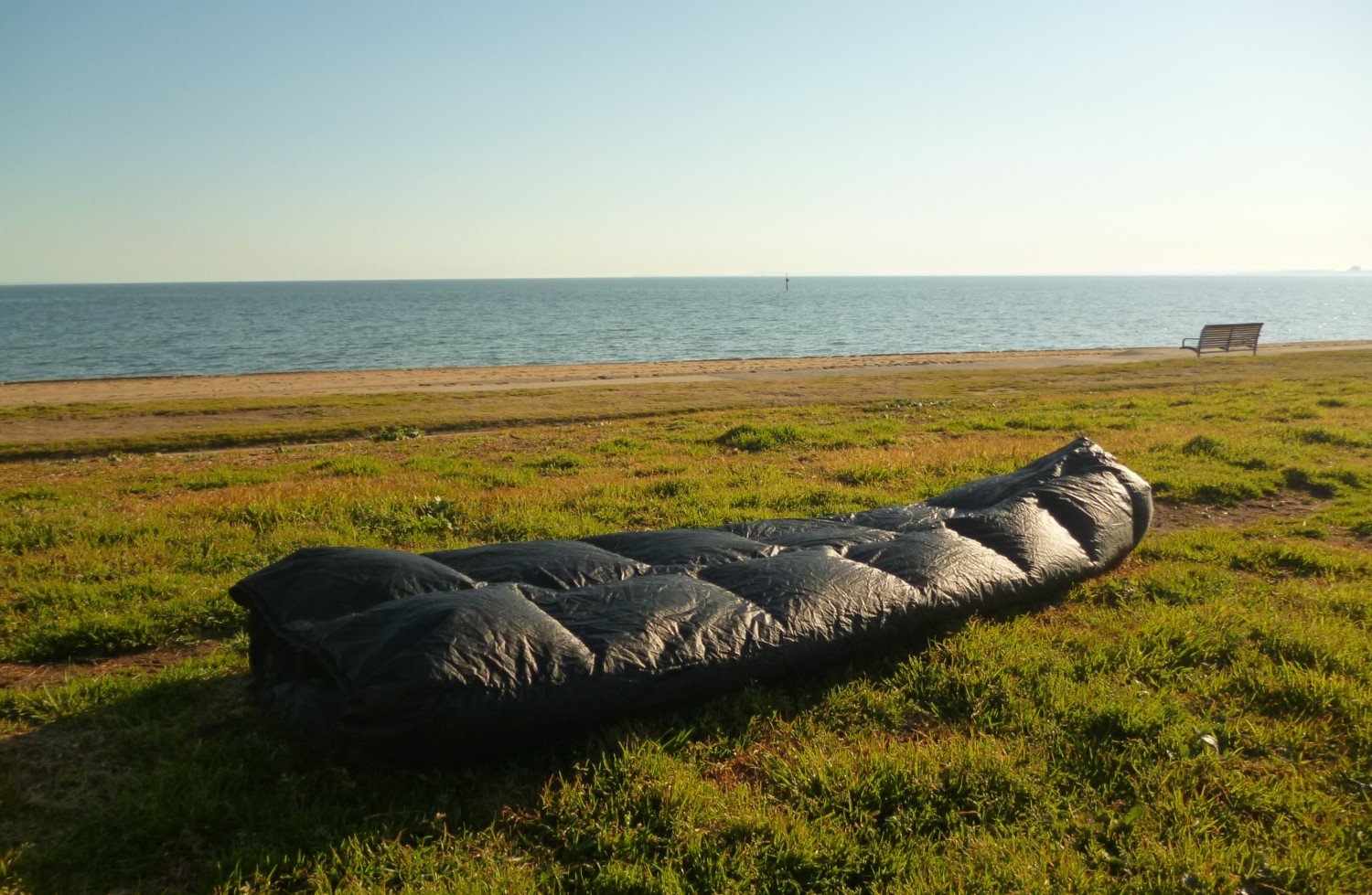  Enlightened Equipment make great bags for three-season ultralight backpacking trips, including options that bridge the gap between a quilt or a bag. 