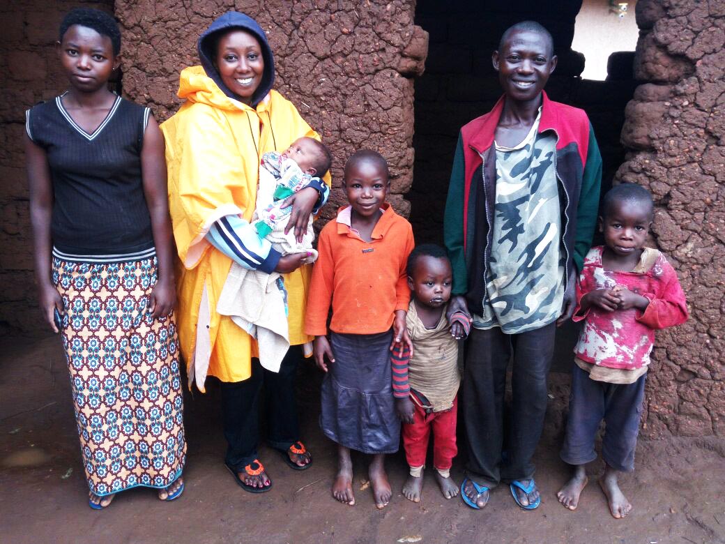 Annonciata, GHI Health Coordinator, with baby Chantal and her Family