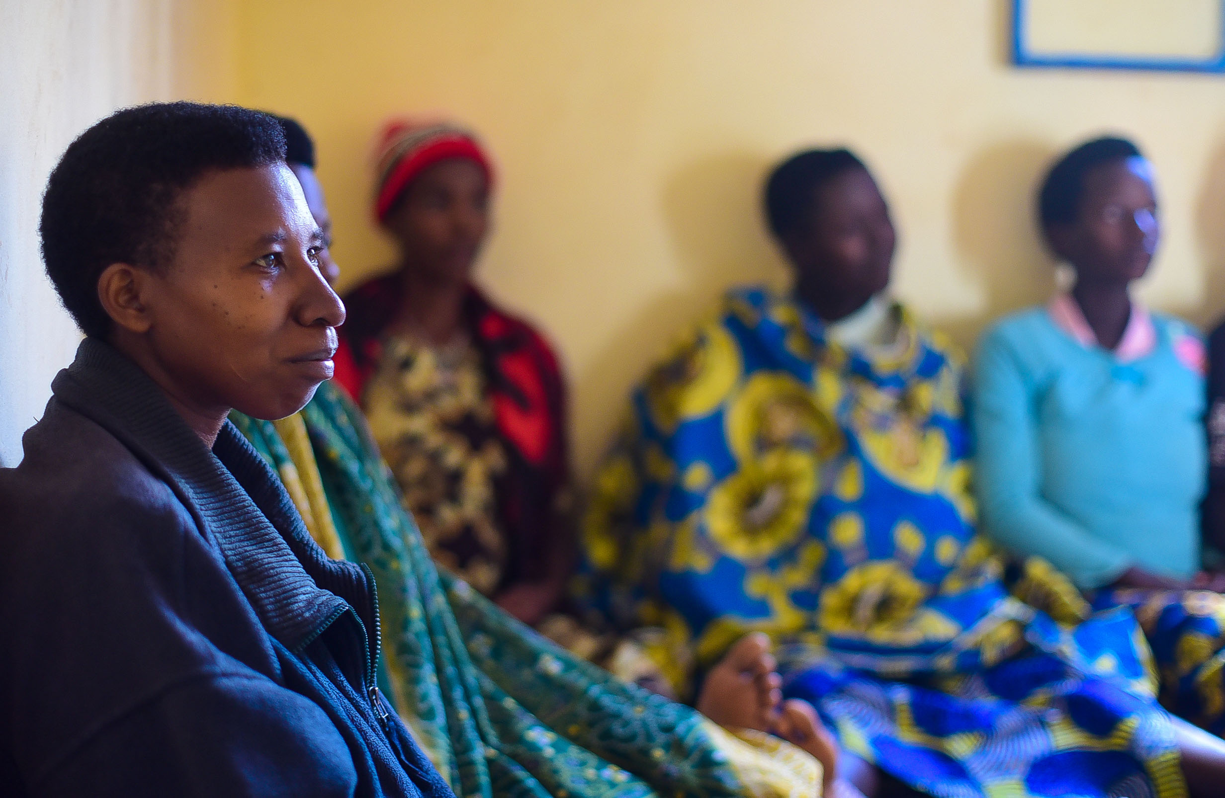 ANC participants listen during a nutrition training in Kayanga village.