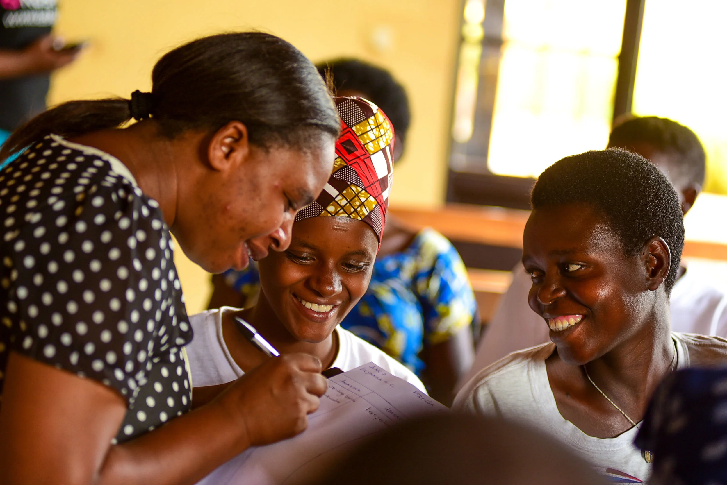 Utanga amahugurwa muri Gasabo Esperance Mukeshimana ahitamo abazajya muri gahunda y'umurima w'ubuzima yo kwita kubagore batwite (Antenatal Care Program) muri Mutarama, 17, 2018.