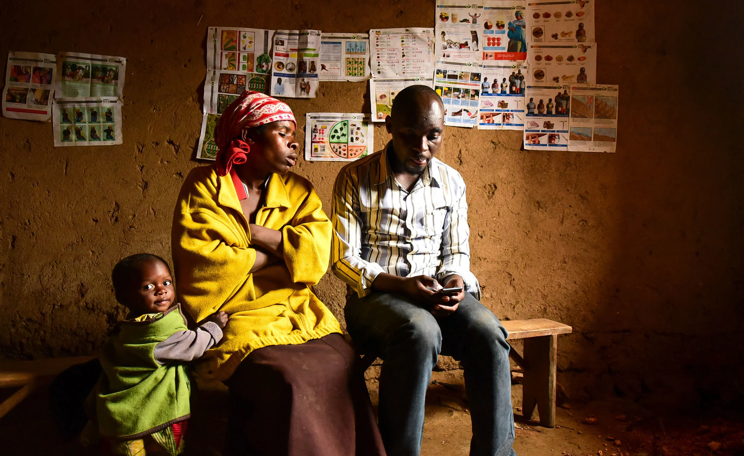 Nyiraribora Ornella is visited by a GHI Monitoring and Evaluation agent in her home. Ornella graduated from Busogo Health Center one year ago.